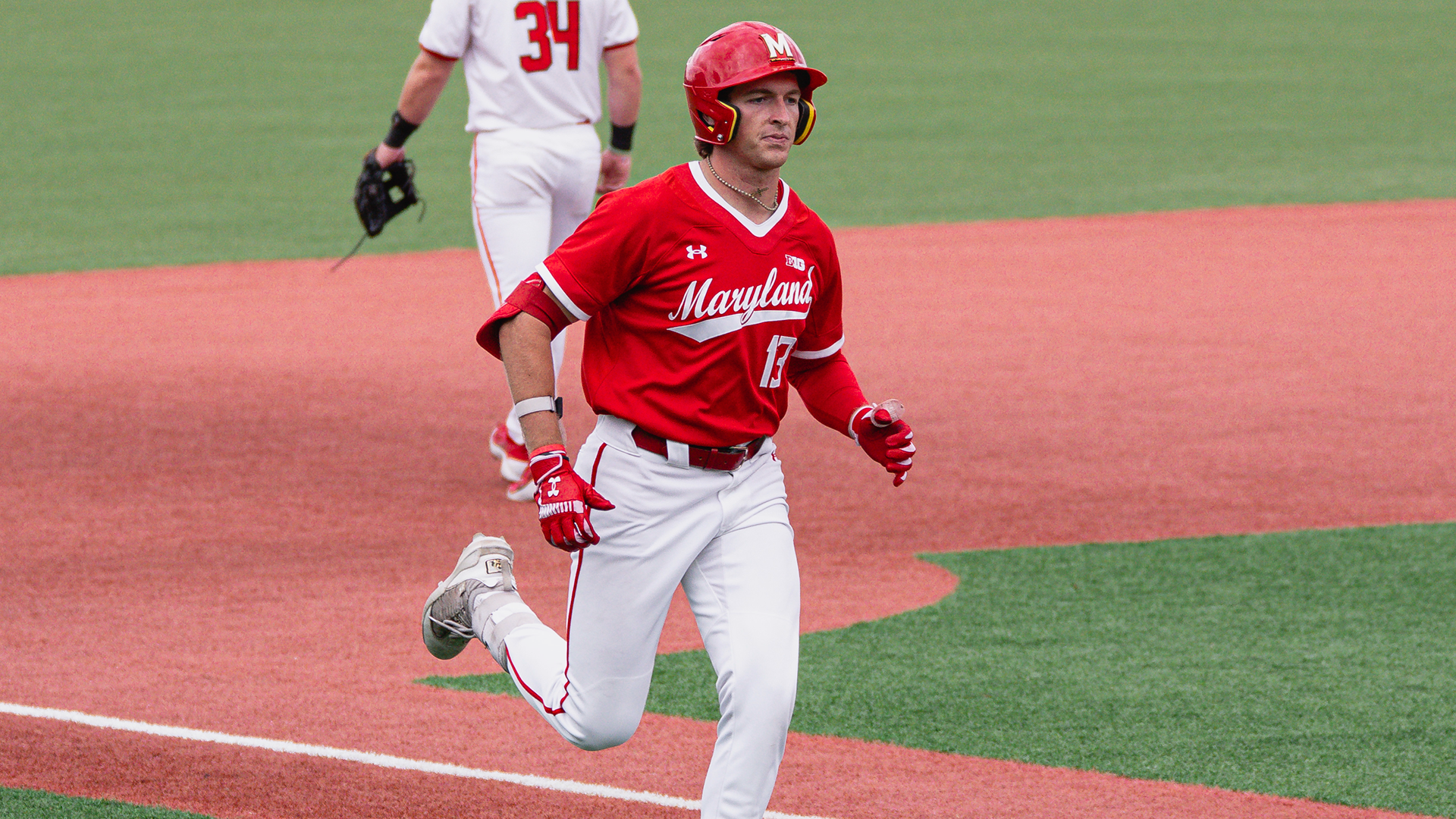 Ryan Costello Rounds the Bases After a Homer Against Ohio State