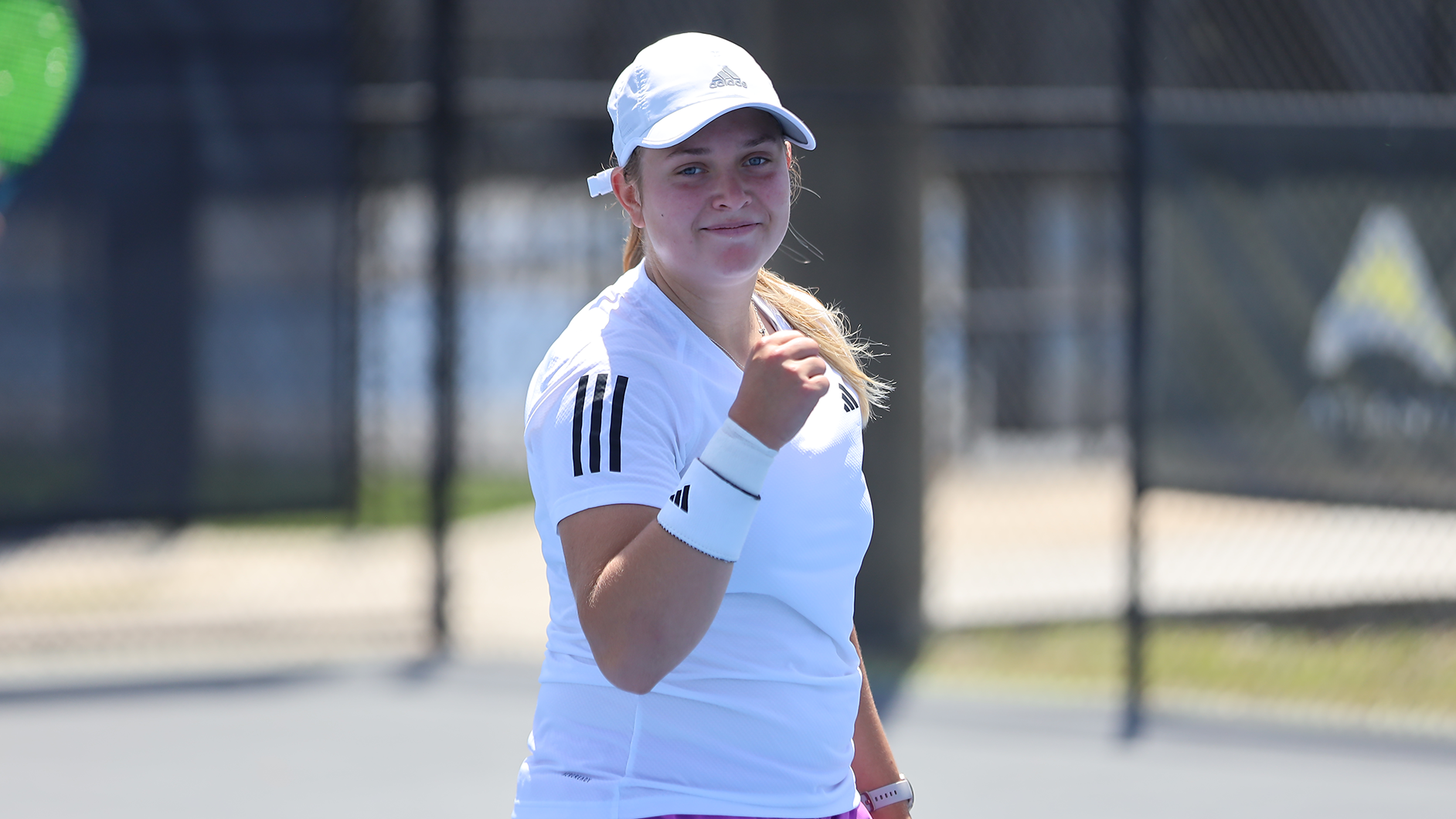 Mathilde Delaney smiling during the ASUN Tournament Final against Stetson on April 19, 2025