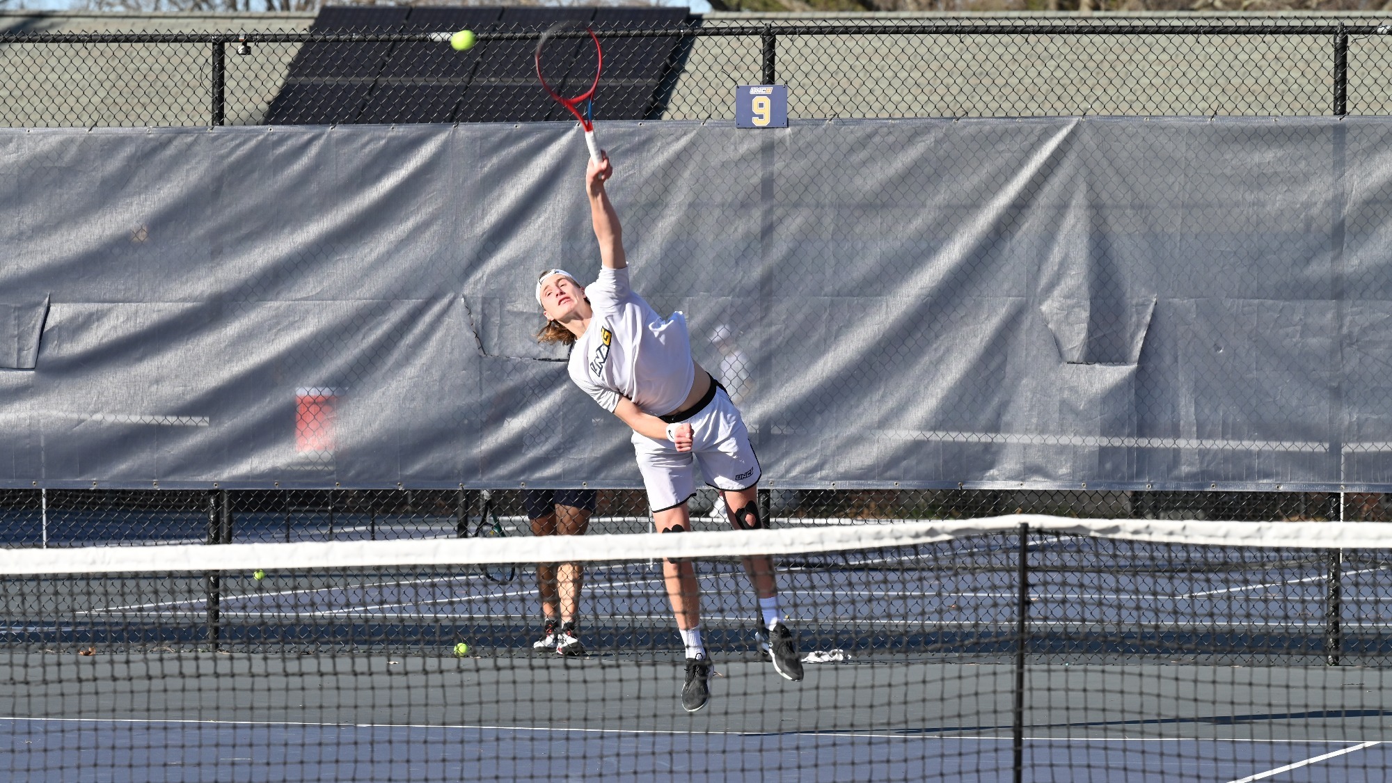 JMU Gets Past Men’s Tennis, 61 UNC Greensboro