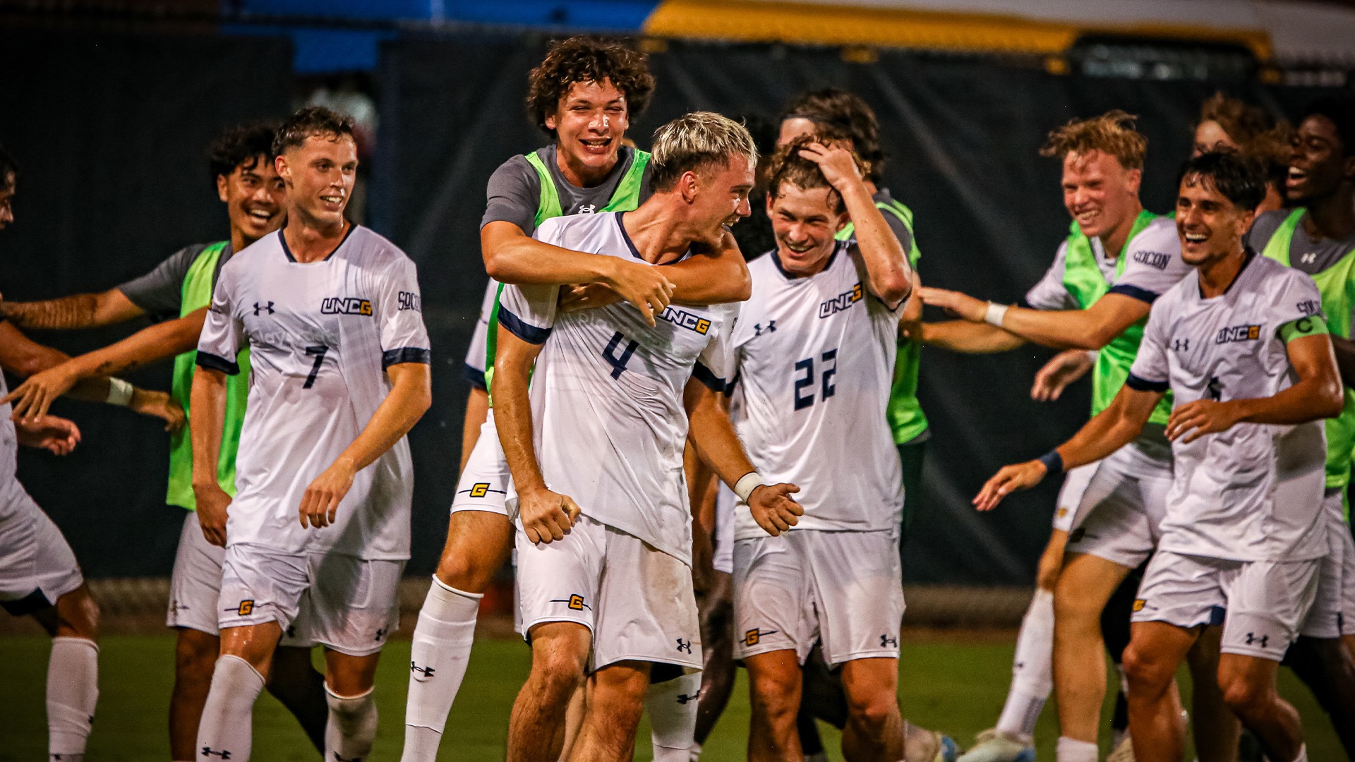 Men's Soccer celebrates the winner against Liberty