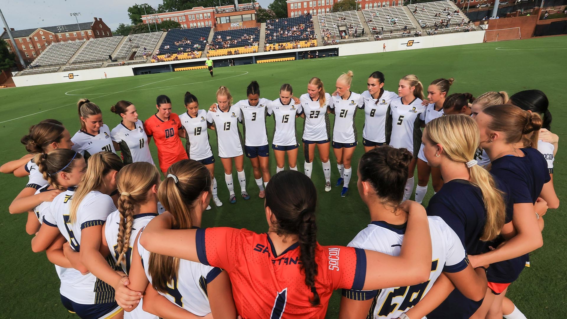 Women's Soccer Team Huddle