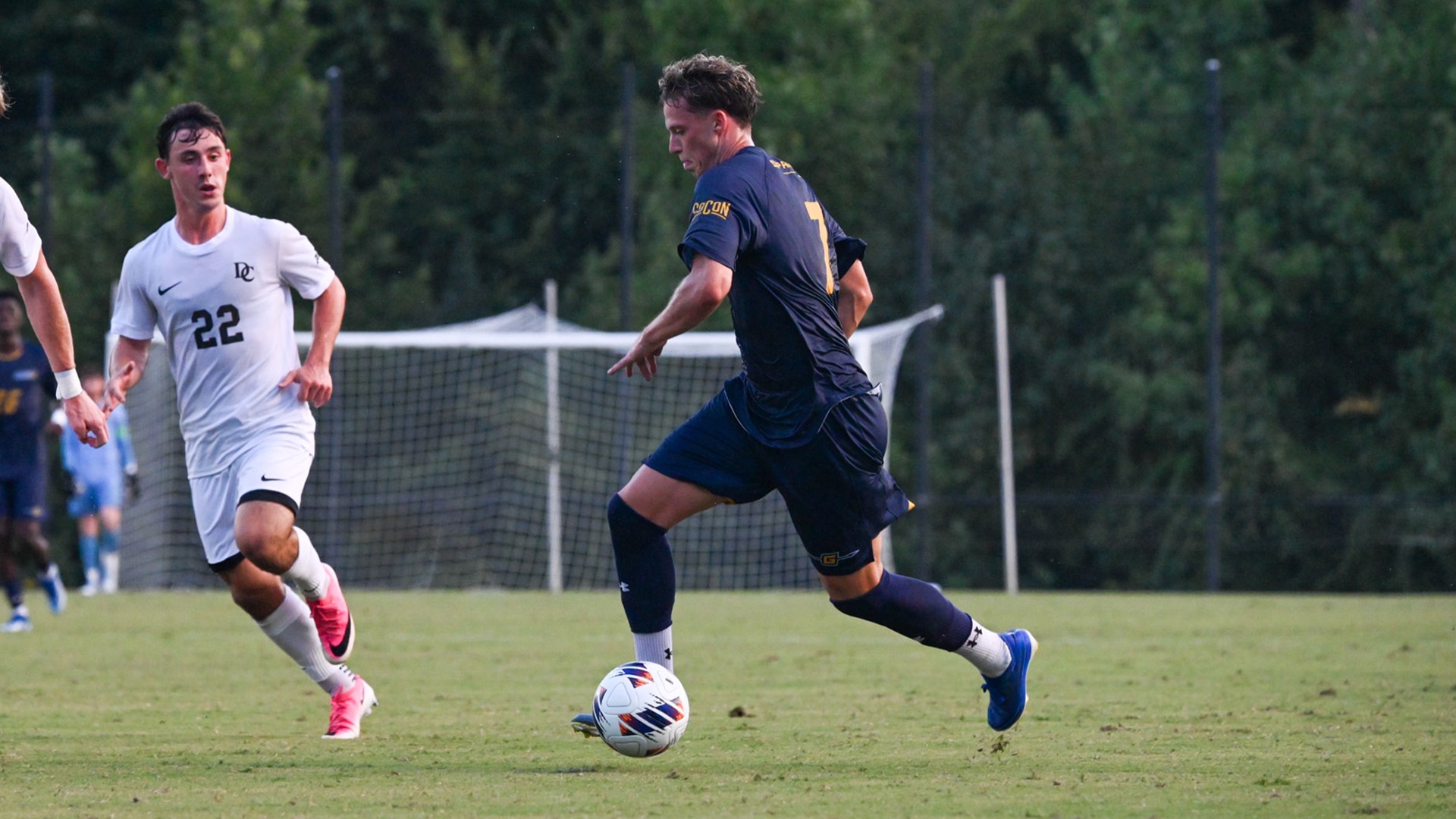 Lasse Dahl dribbling against Davidson