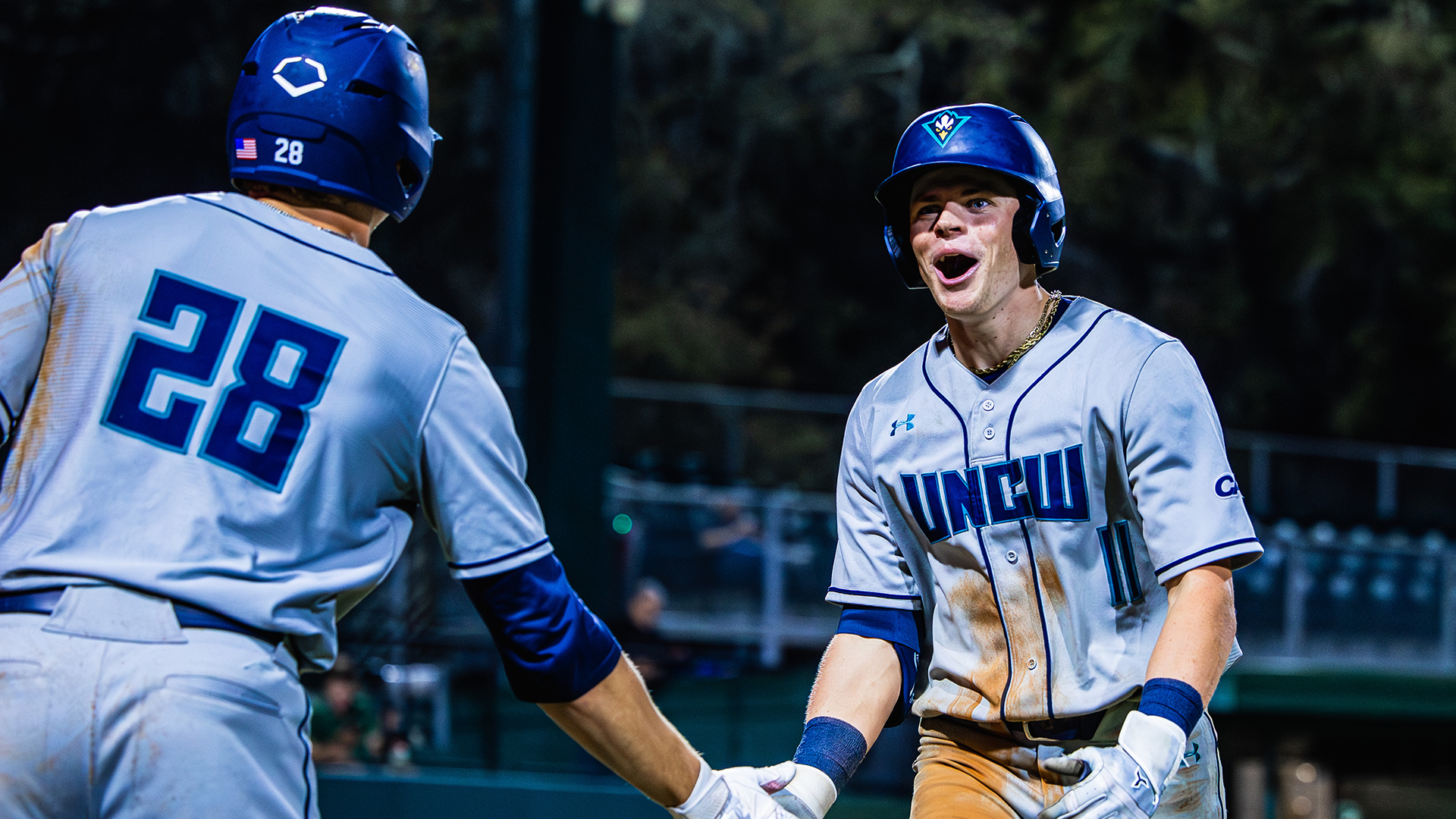 Hughes celebrates a homer at Jacksonville