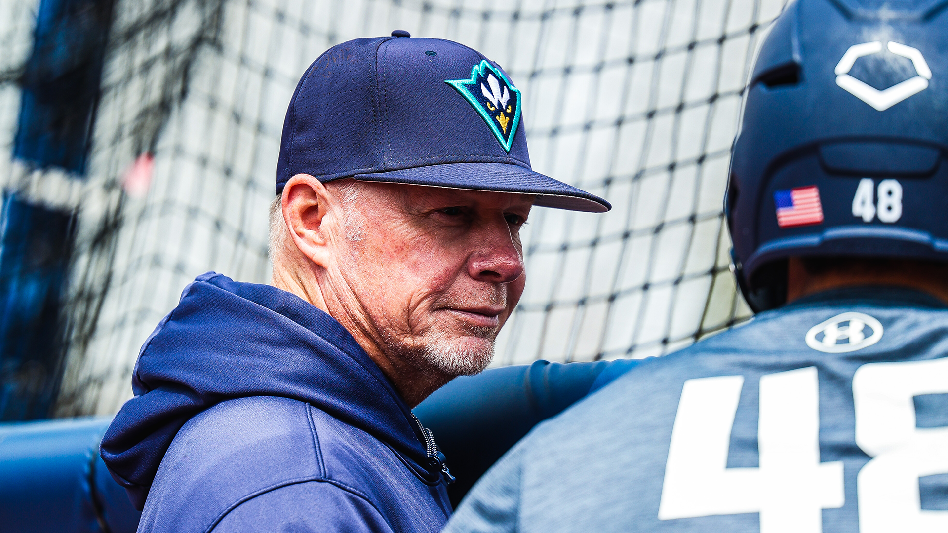 Hood behind the cage in batting practice