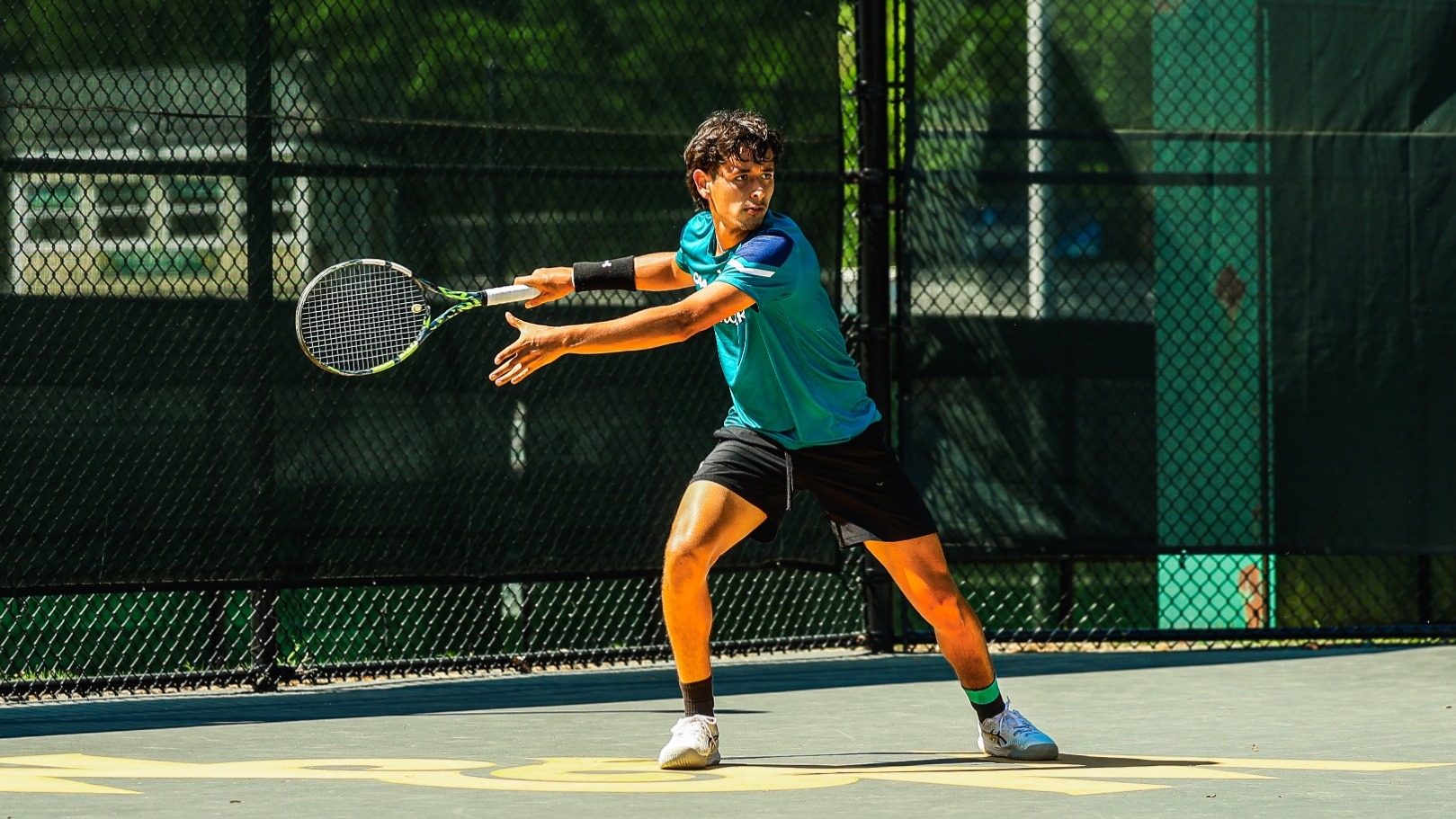 Tomas Marin in singles play at CAA semifinals sealing win for Seahawks