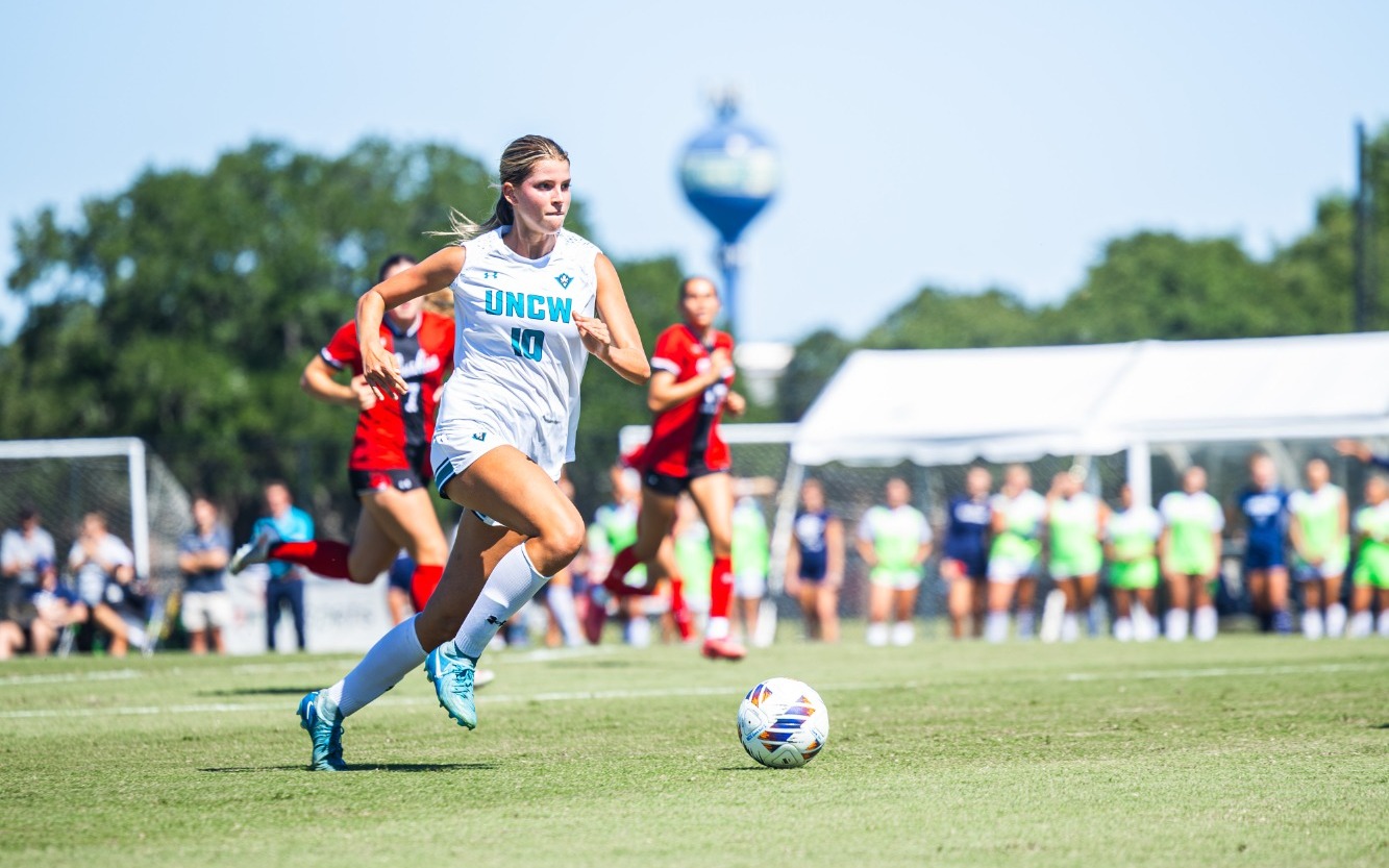 Allie Planeaux scores against Northeastern