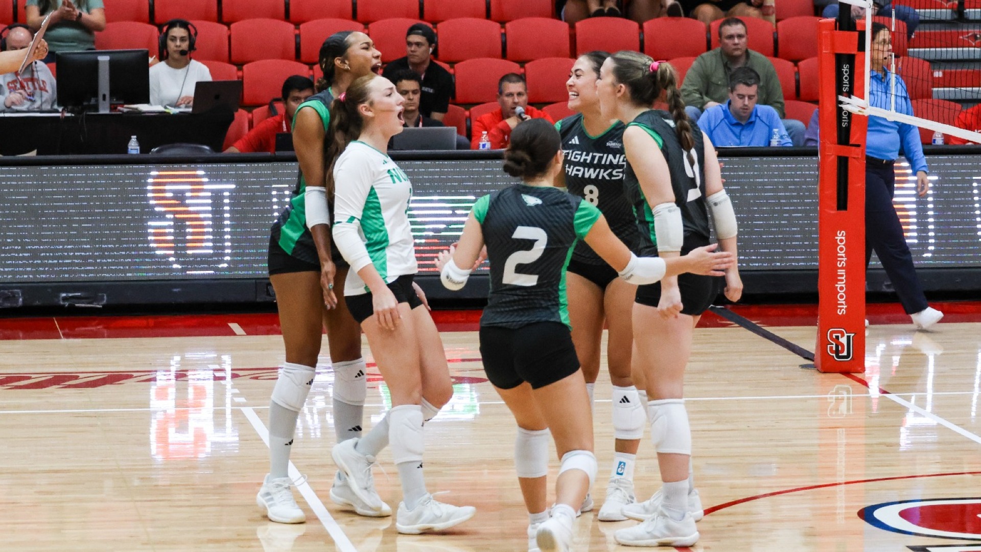 UND Volleyball celebration at Seattle U