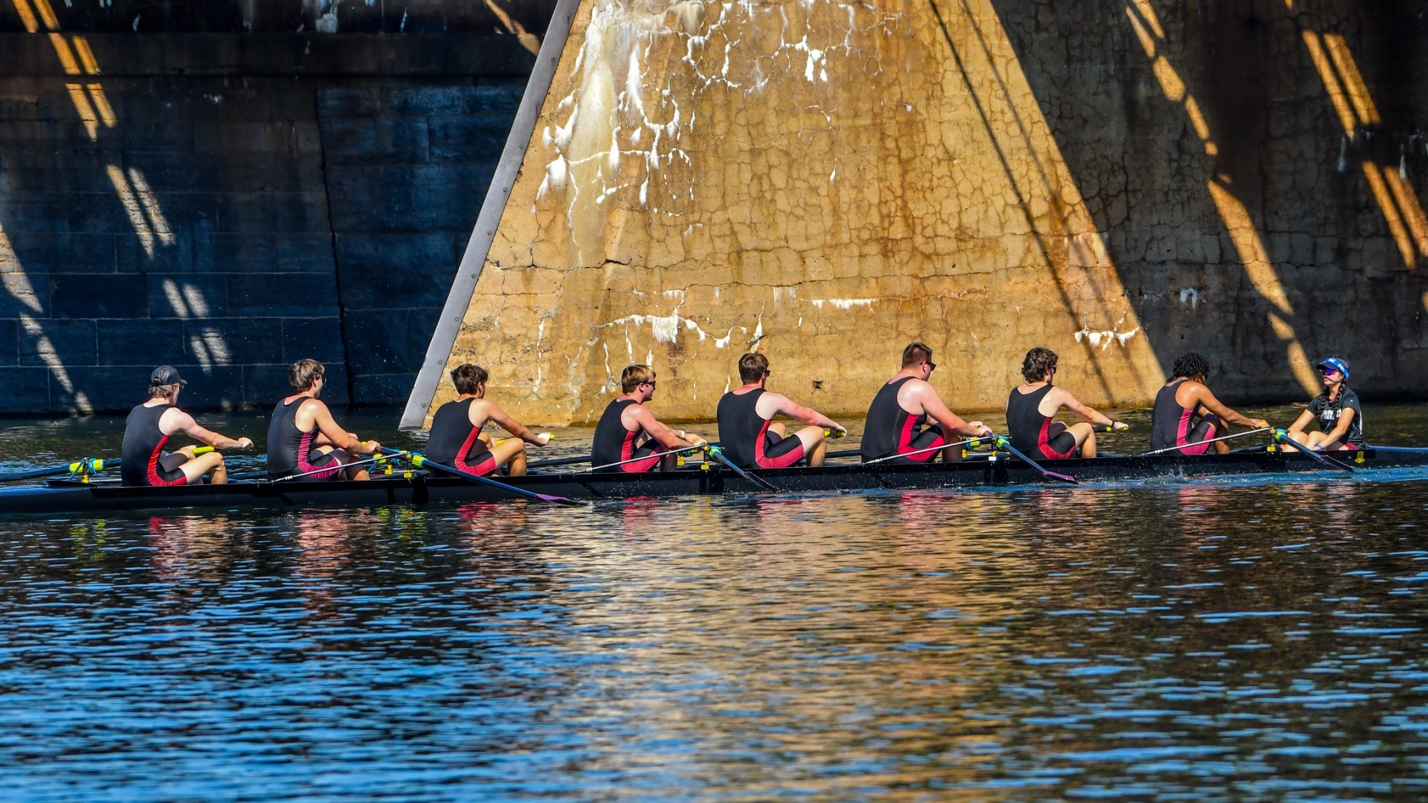 Men's Crew Varsity 8+ boat in the water