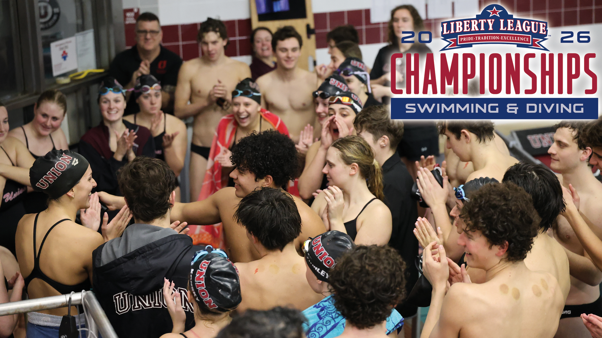 a swim team huddled up and cheering before a meet, several athletes wear swim caps that read 