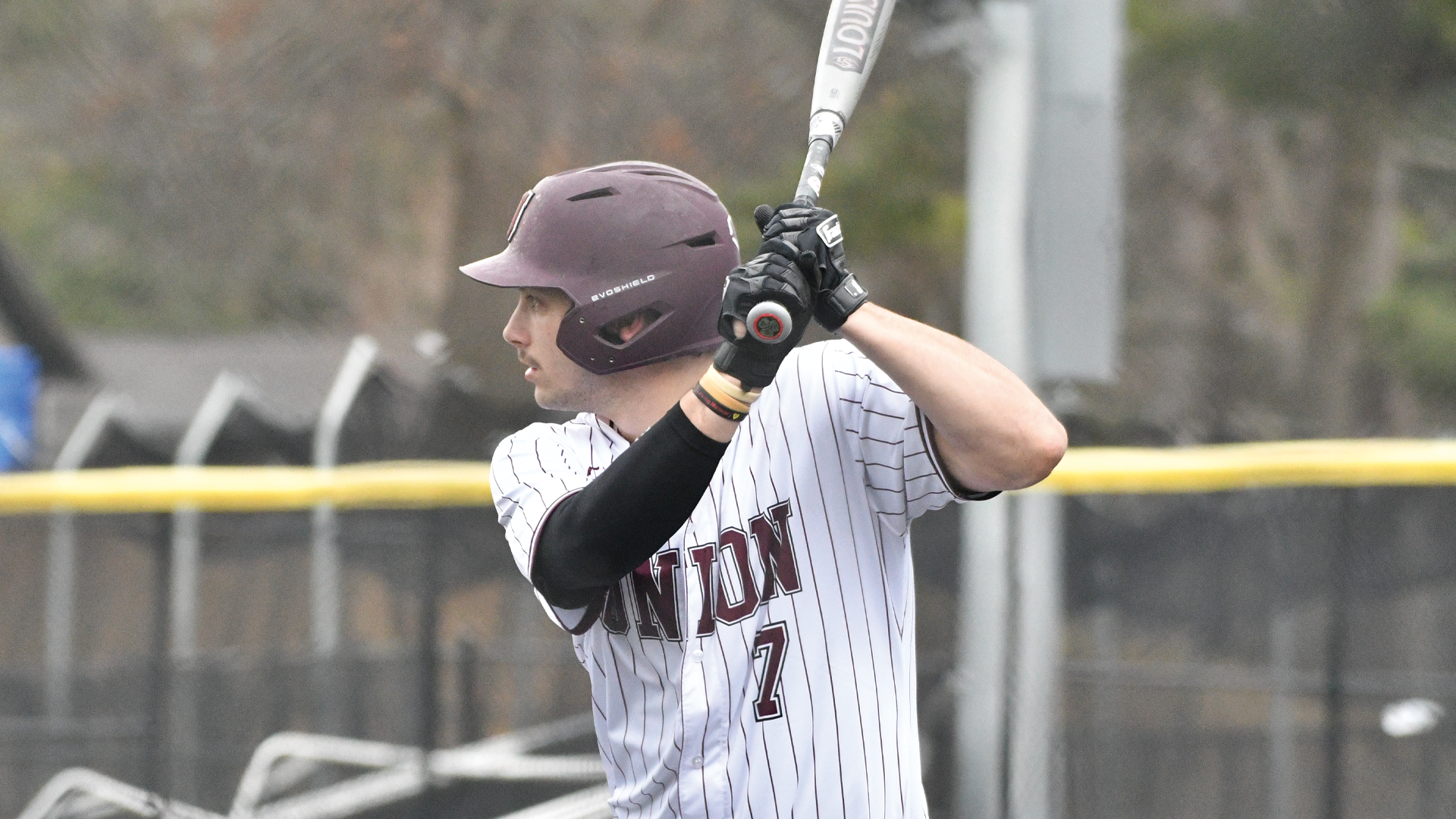 left-handed batter standing in the batters box