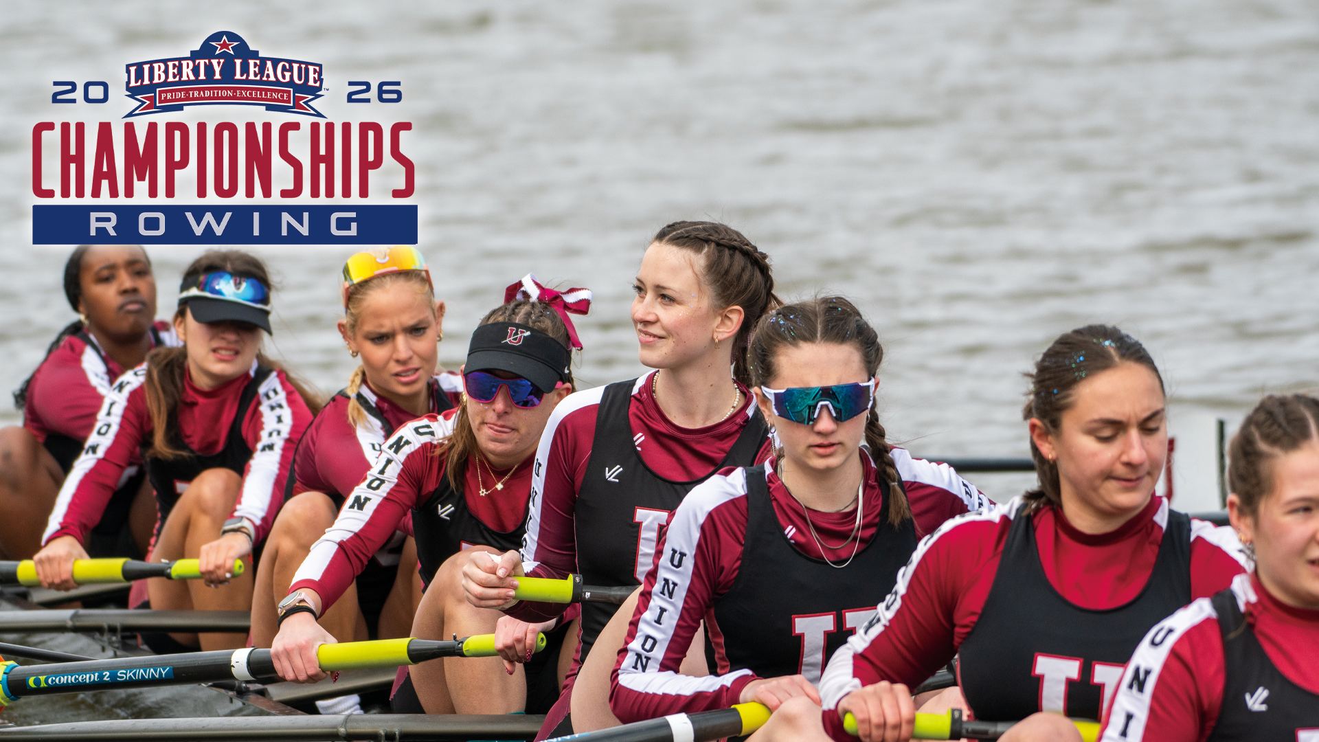 a photo of a women's crew team in their boat launching off the dock before a race, with the student-athlete in the middle of the boat in focus of the picture, smiling and looking to her right. A logo that reads 