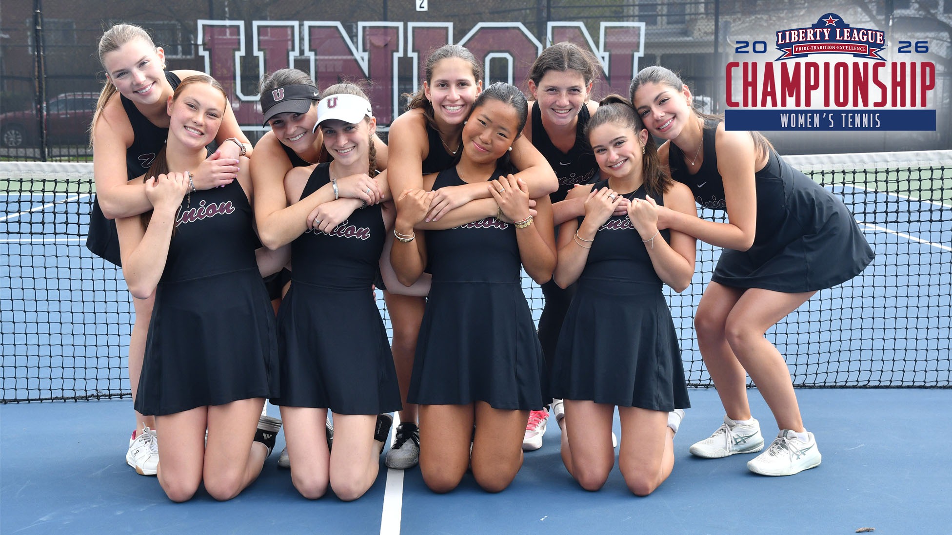 Members of the Union women's tennis team hugging with a Libert League Championship logo in the corner.
