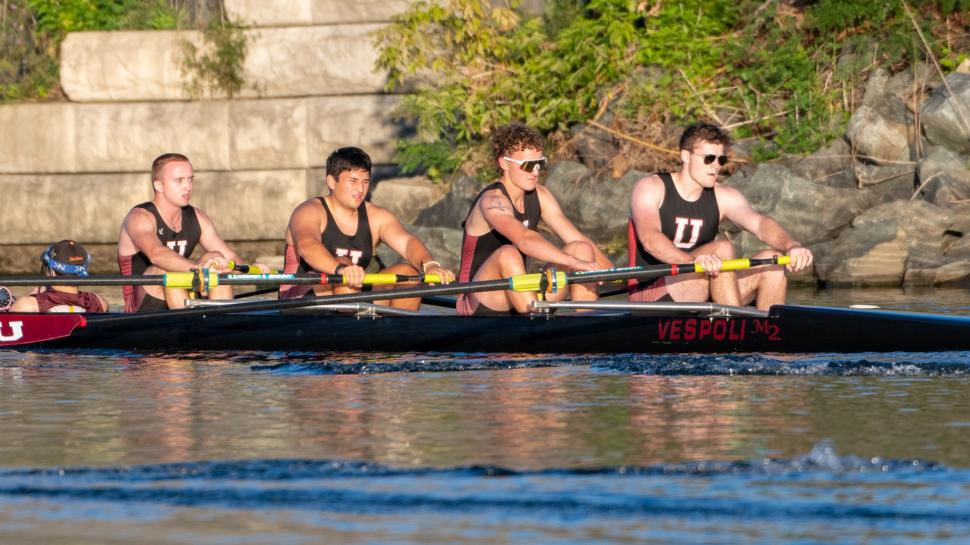 Rowers on a river.