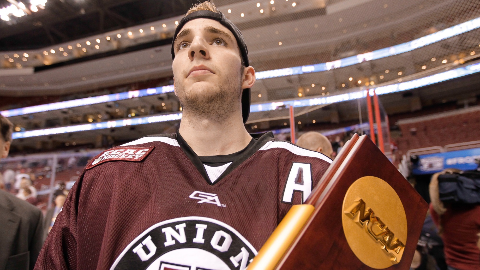 Shayne Gostisbehere with NCAA Championship Trophy