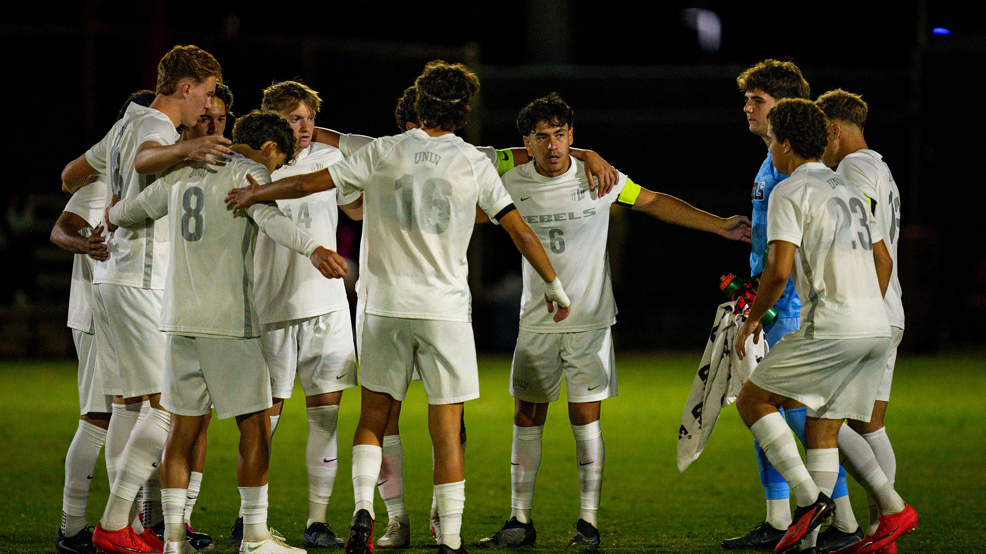 Men's Soccer Team Gathering For Huddle