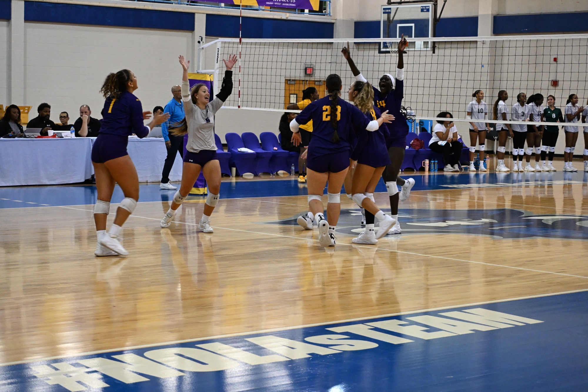 Volleyball Team Celebration vs. Xavier