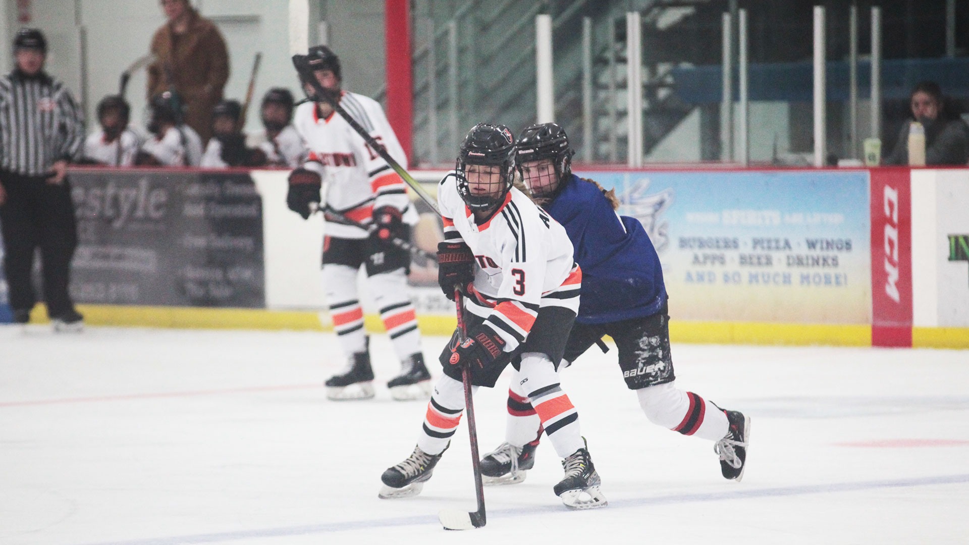 Faith Van Voorst faces pressure from a Wisconsin Eau Claire defender Saturday, October 11 at John L. Wilson Arena