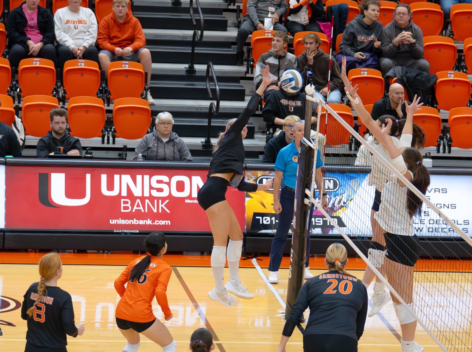 Mya Foslien attacks ball 