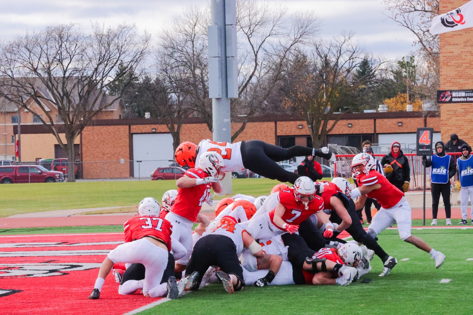 UJ's Zach Hammett soars over the goal line for a third-quarter touchdown against Minnesota State University Moorhead on November 8, 2025