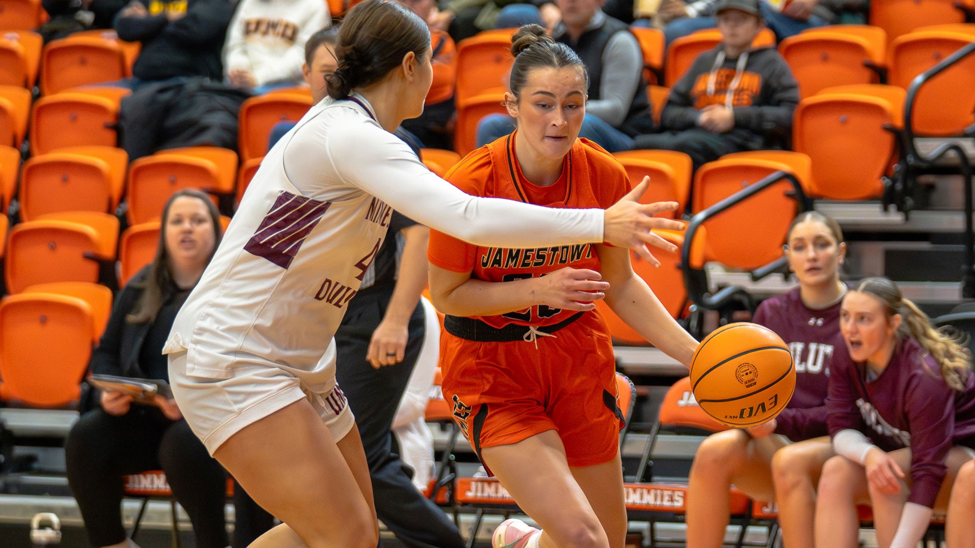 Jamestown's Jessika Lofstrom drives to the basket against Minnesota Duluth's Maria Counts on Saturday, December 13, 2025 at Harold Newman Arena