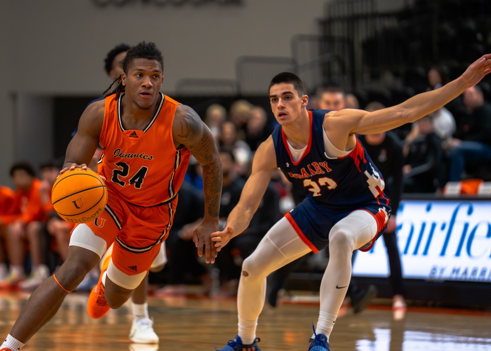 Anthony Walters dribbles passed by UMary defender in the Harold Newman Arena December 6, 2025 