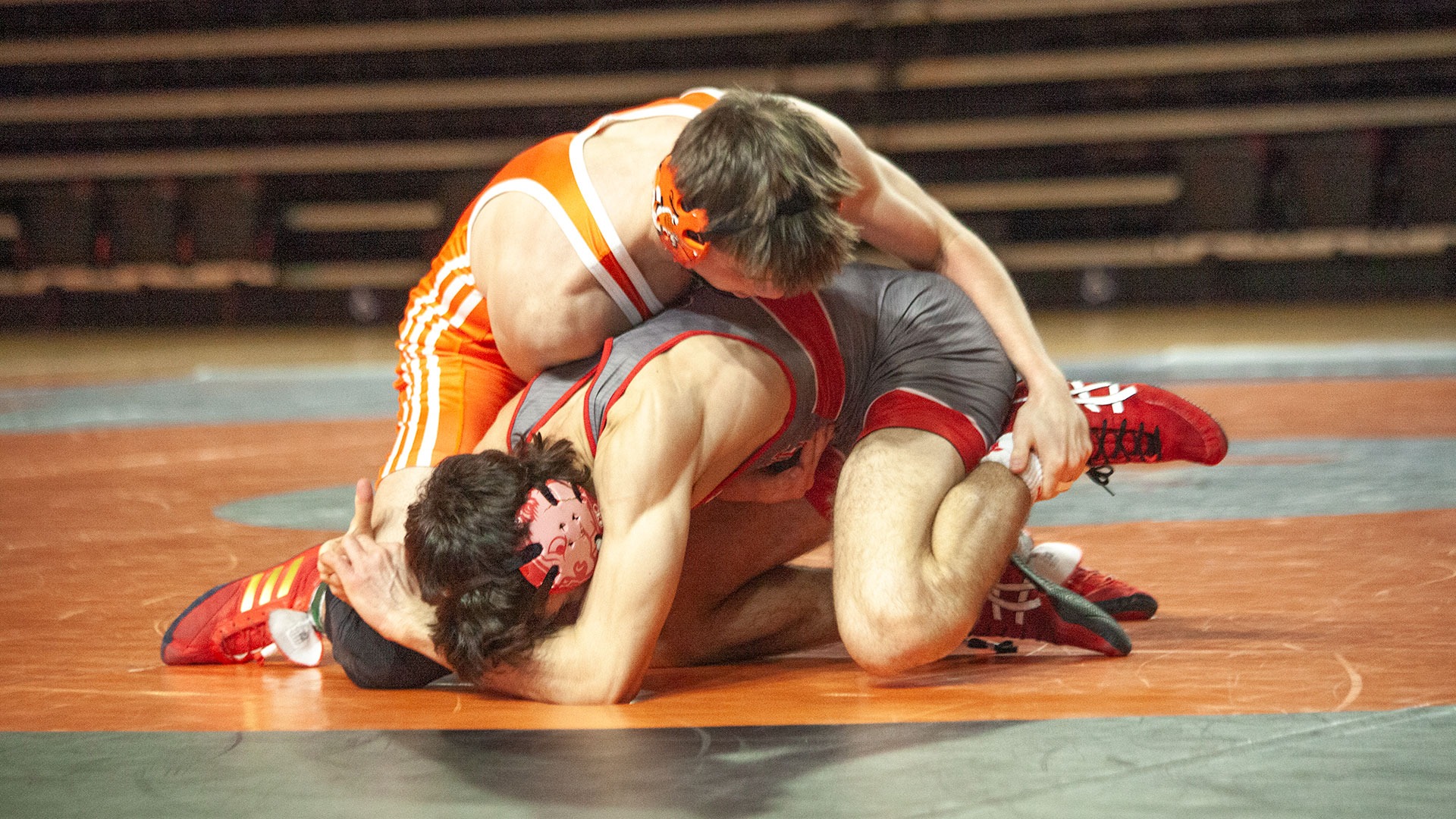 UJ's Maddox Campbell tries to gain the upper hand in his 157 pound match against Minot State's Robert Salehi