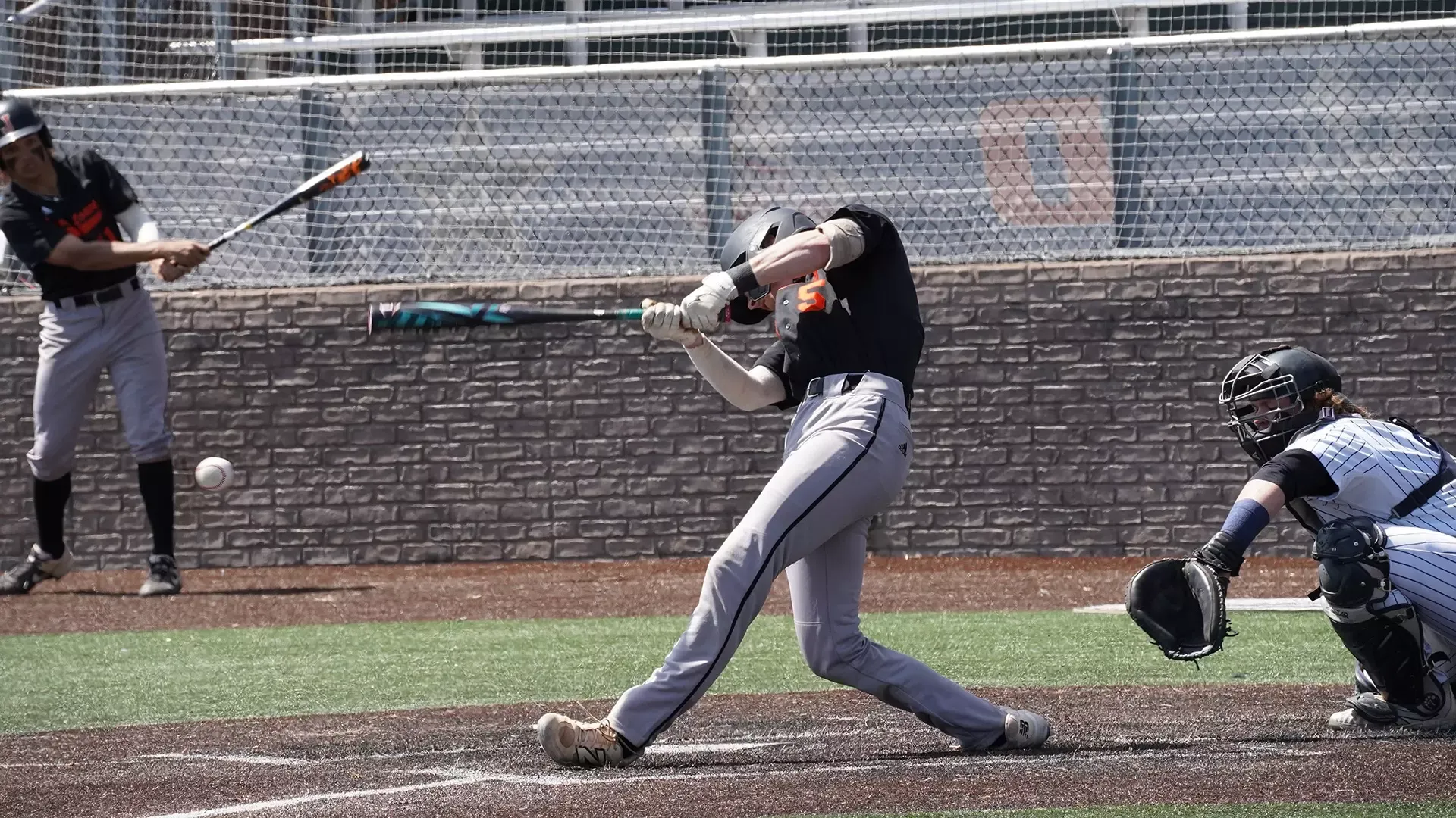 Triston Madison makes contact against La Sierra Friday in the NSAA tournament