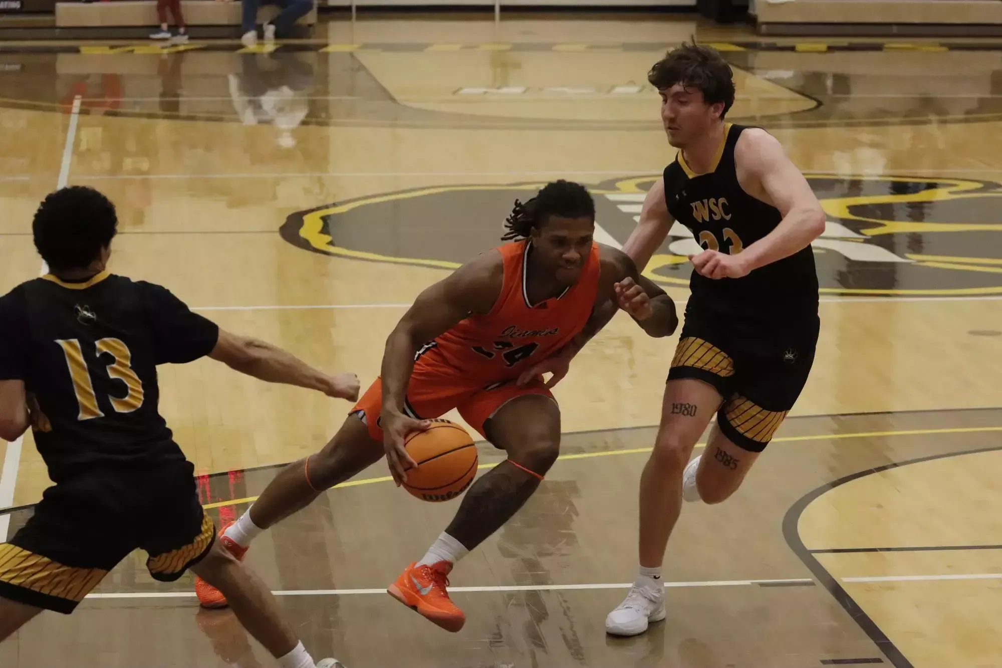Anthony Walters dribbles past a Wayne State defender in their 73-70 victory in the Rice Auditorium on January 10, 2026