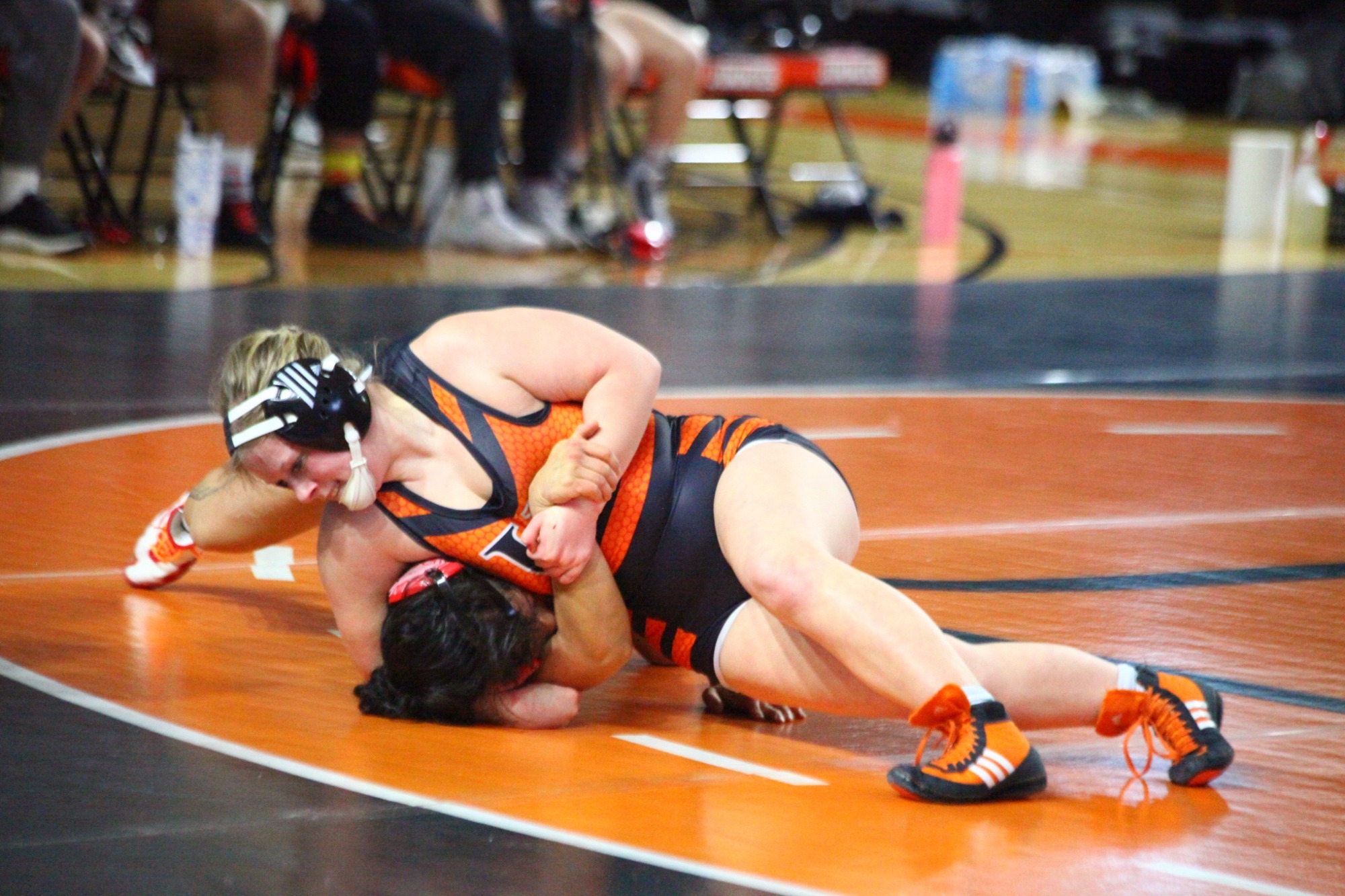 UJ's Abby Ewing gets the upper hand against Minot State's Lovey Beebe in their match on January 18, 2026