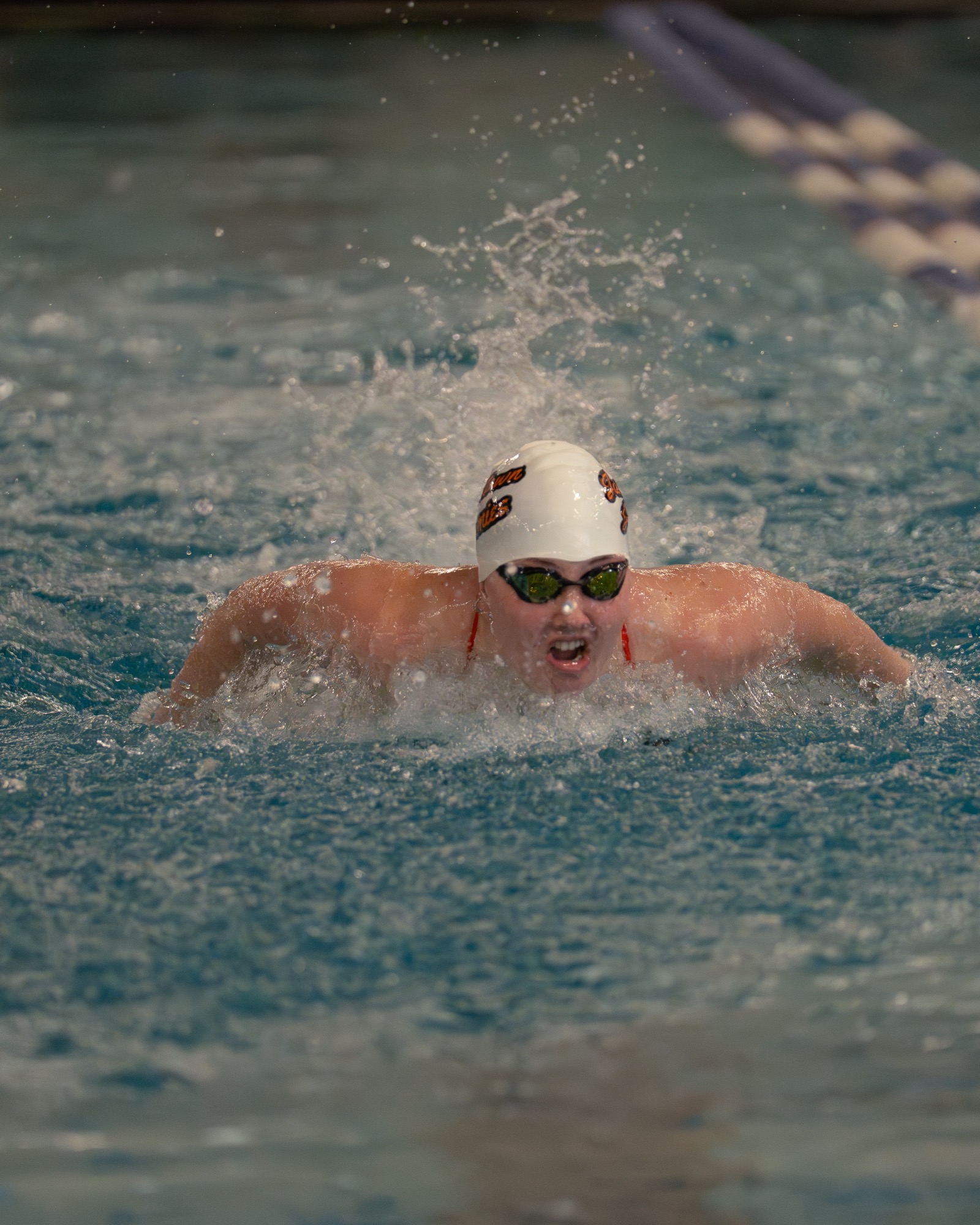 A swimmer breaks water during the breaststroke during their dual against Concordia College in the Jamestown High School Pool on January 21, 2026 