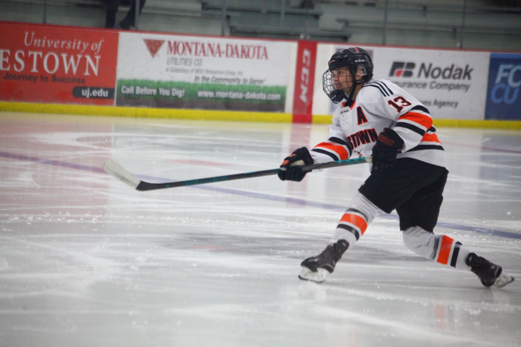 UJ's Chloe Gauthier shoots the puck against Indiana Tech earlier this season