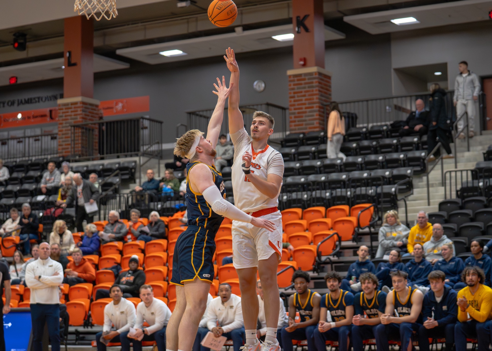 Carson Woodford shoots over Concordia St. Paul defender in the Harold Newman Arena on January 16,2026 