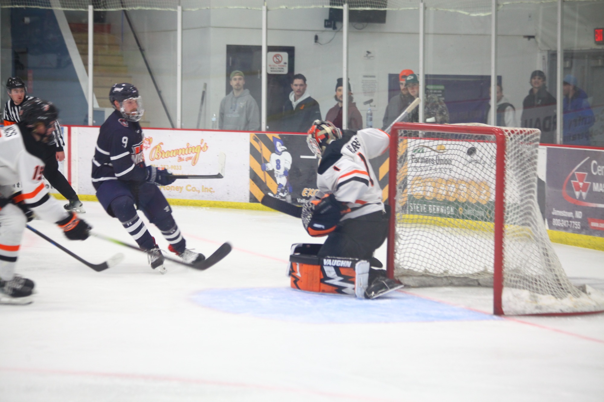 UJ goaltender Brandon Weare makes a save against UMary earlier this season