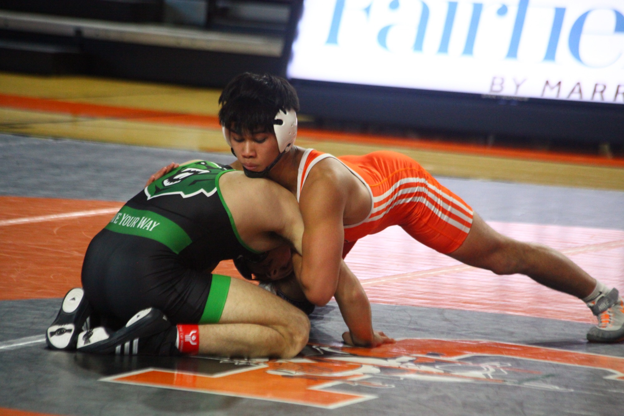 UJ's Rocker Aguilar faces Liam Fox of UW-Parkside in Sunday's dual at Harold Newman Arena