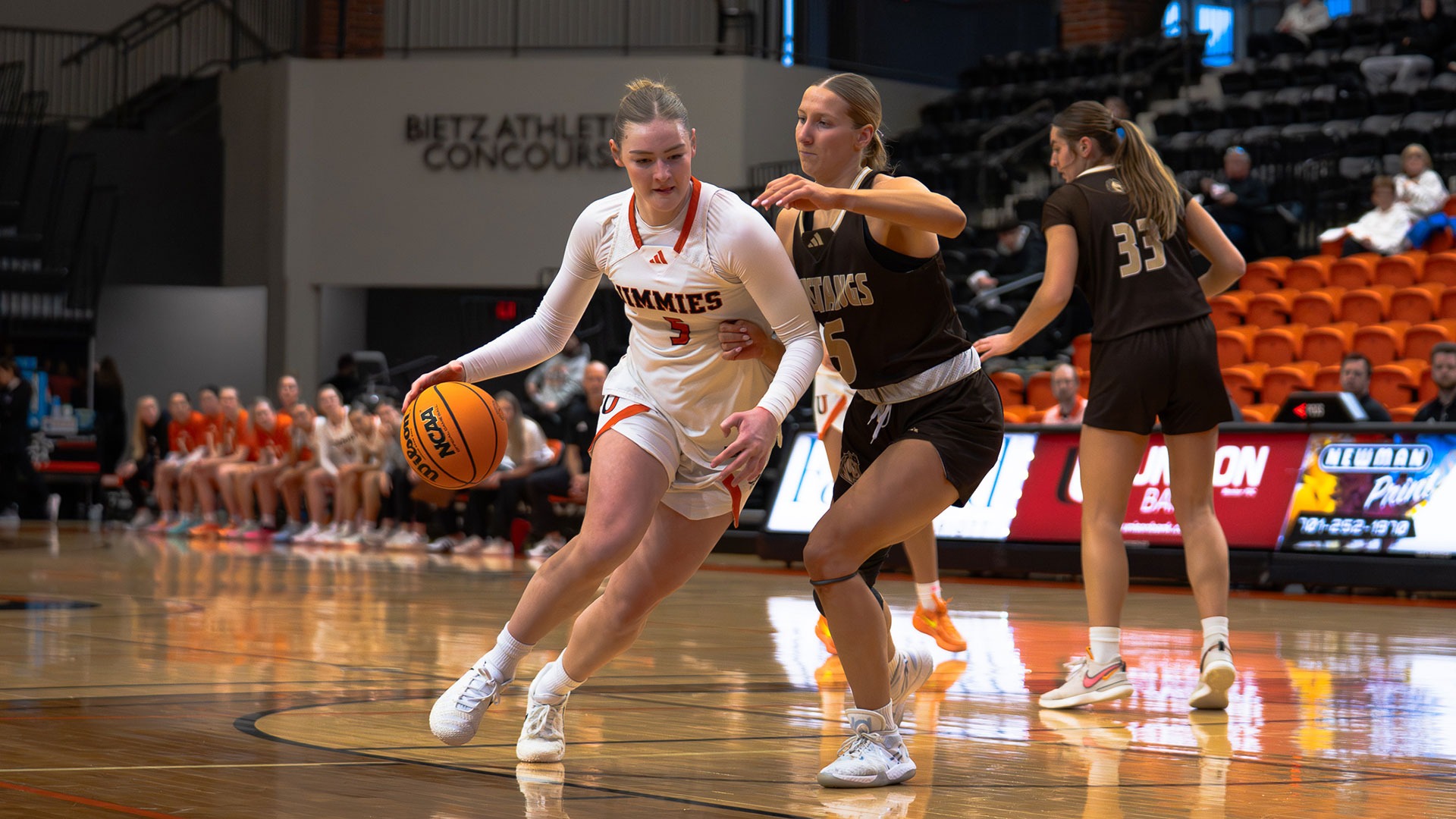 UJ's Allie Berns attempts to dribble past Elizabeth Wagner of Southwest Minnesota State during Friday's game.
