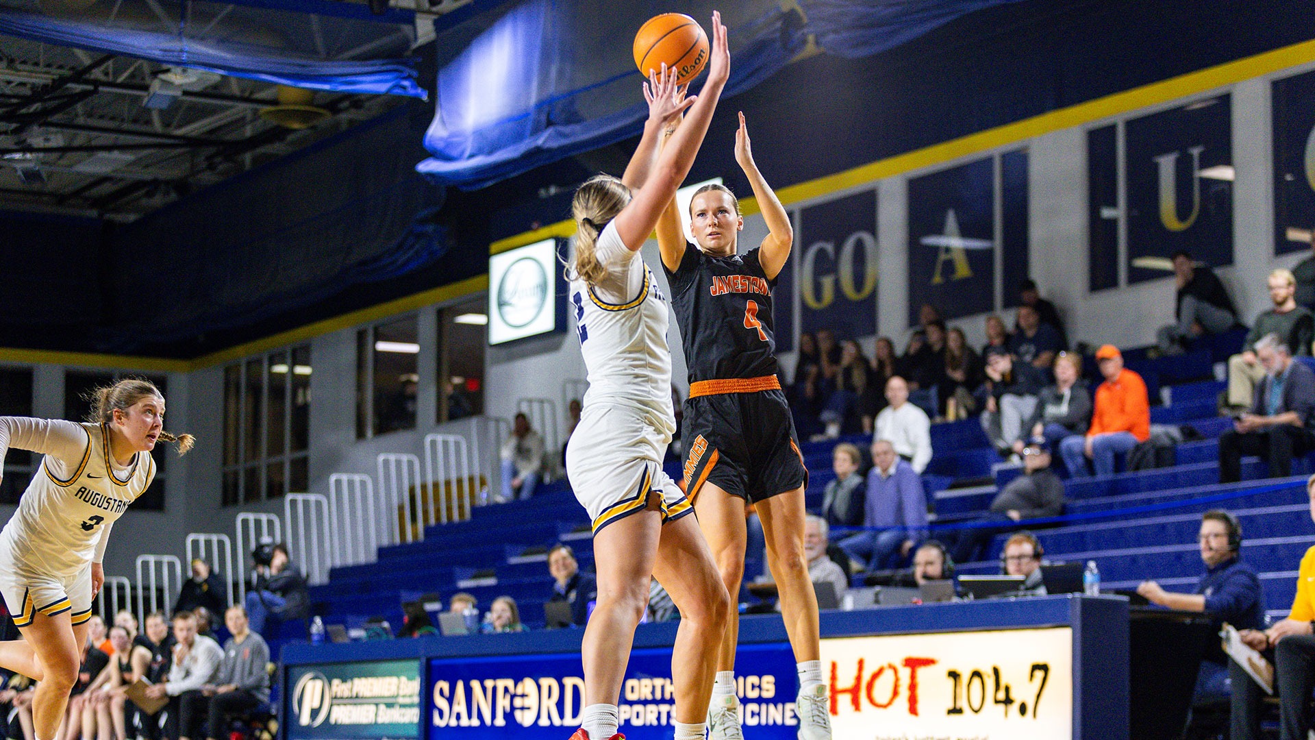 UJ's Emily Kurkowski attempts a shot over Augustana's Ava Pautz on Friday, January 9, 2026