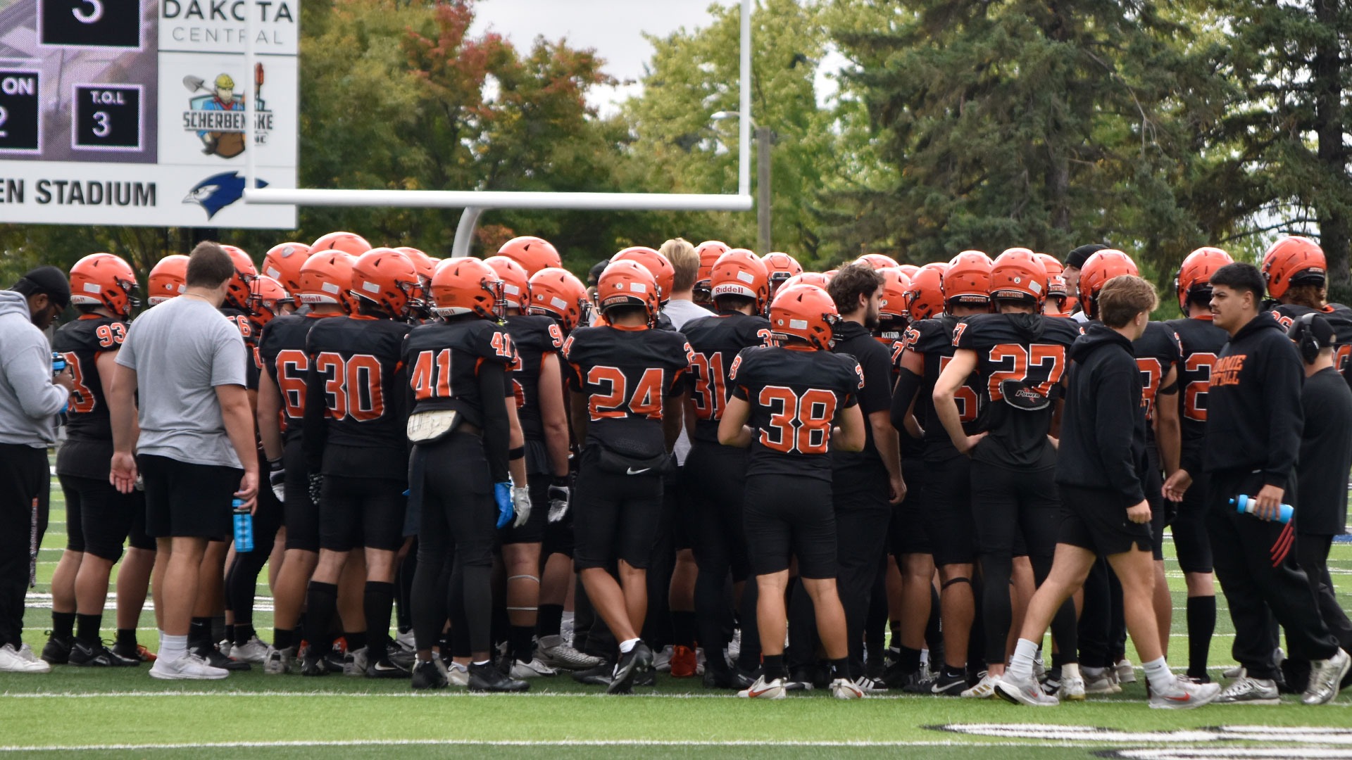 The Jimmie football team huddles during their game on September 26, 2026 against Concordia-St. Paul