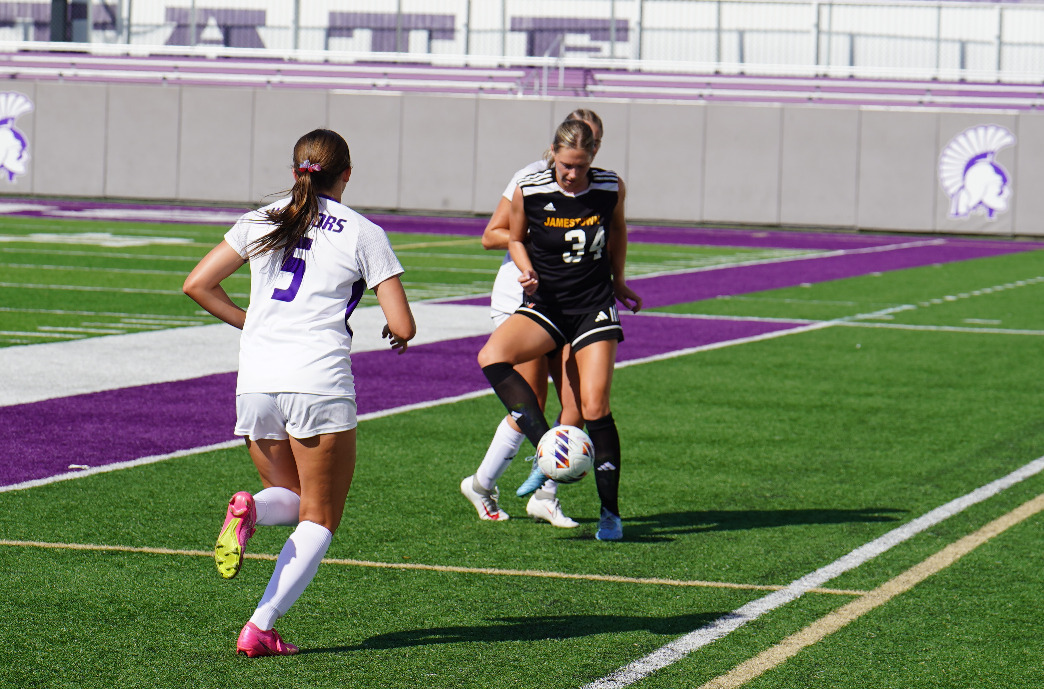 Langley Grow fights for possession against Winona State (9/11)