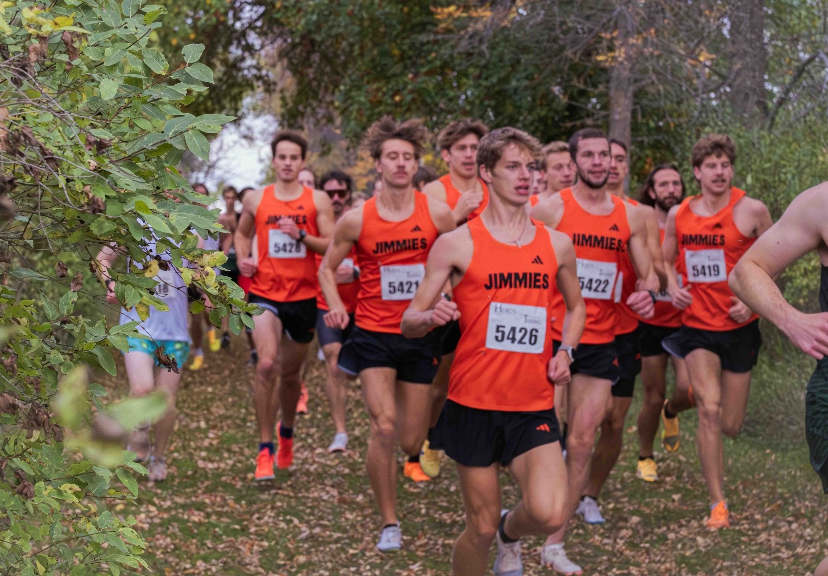 A group of Jimmie runners makes their way through the course during Friday's race at Parkhurst
