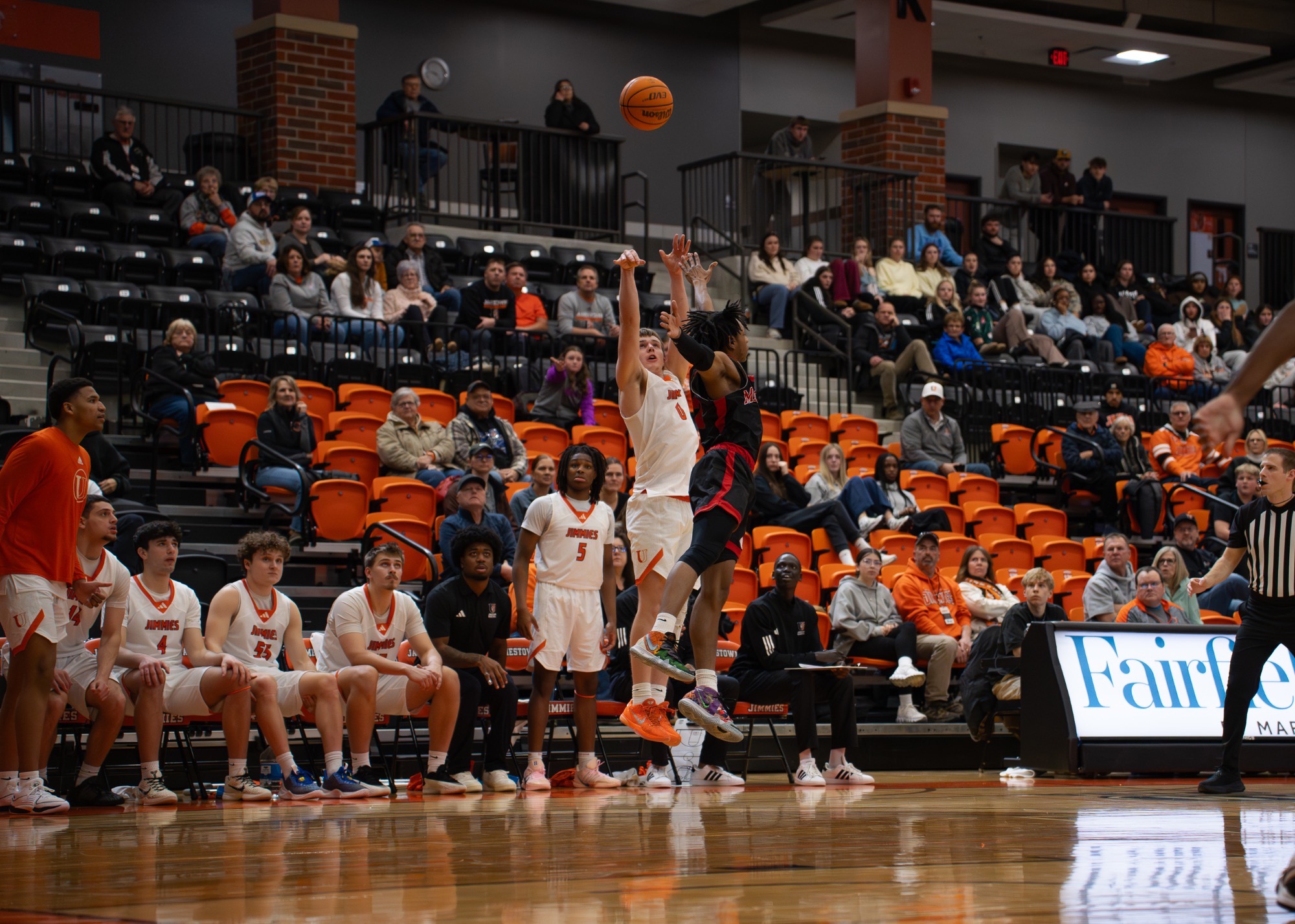 #0 Zeke Austin shoot clutch three pointer over Minot State #2 Deuce Benjamin at the HArold Neman Arena, February 19, 2026