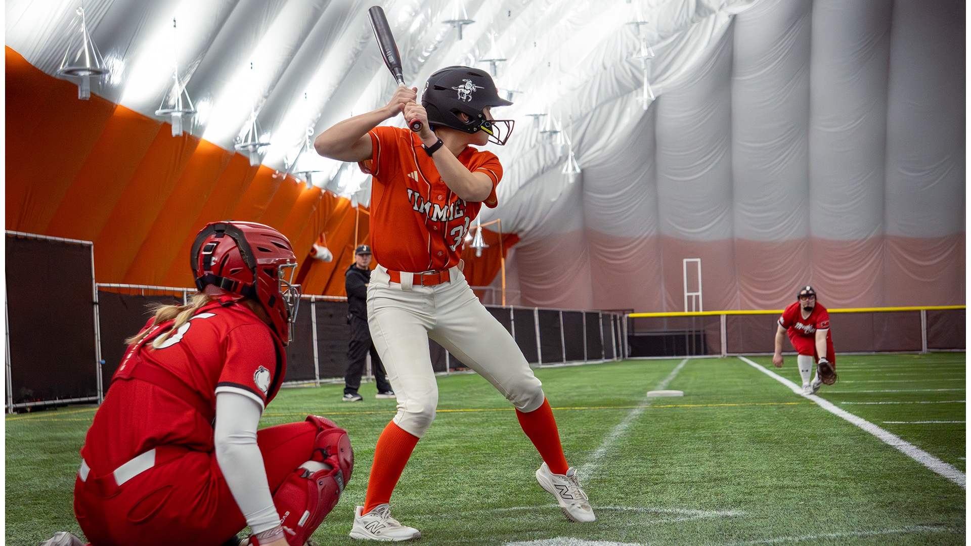 UJ #33 Tori Olson is in batter bow ready for the pitch 