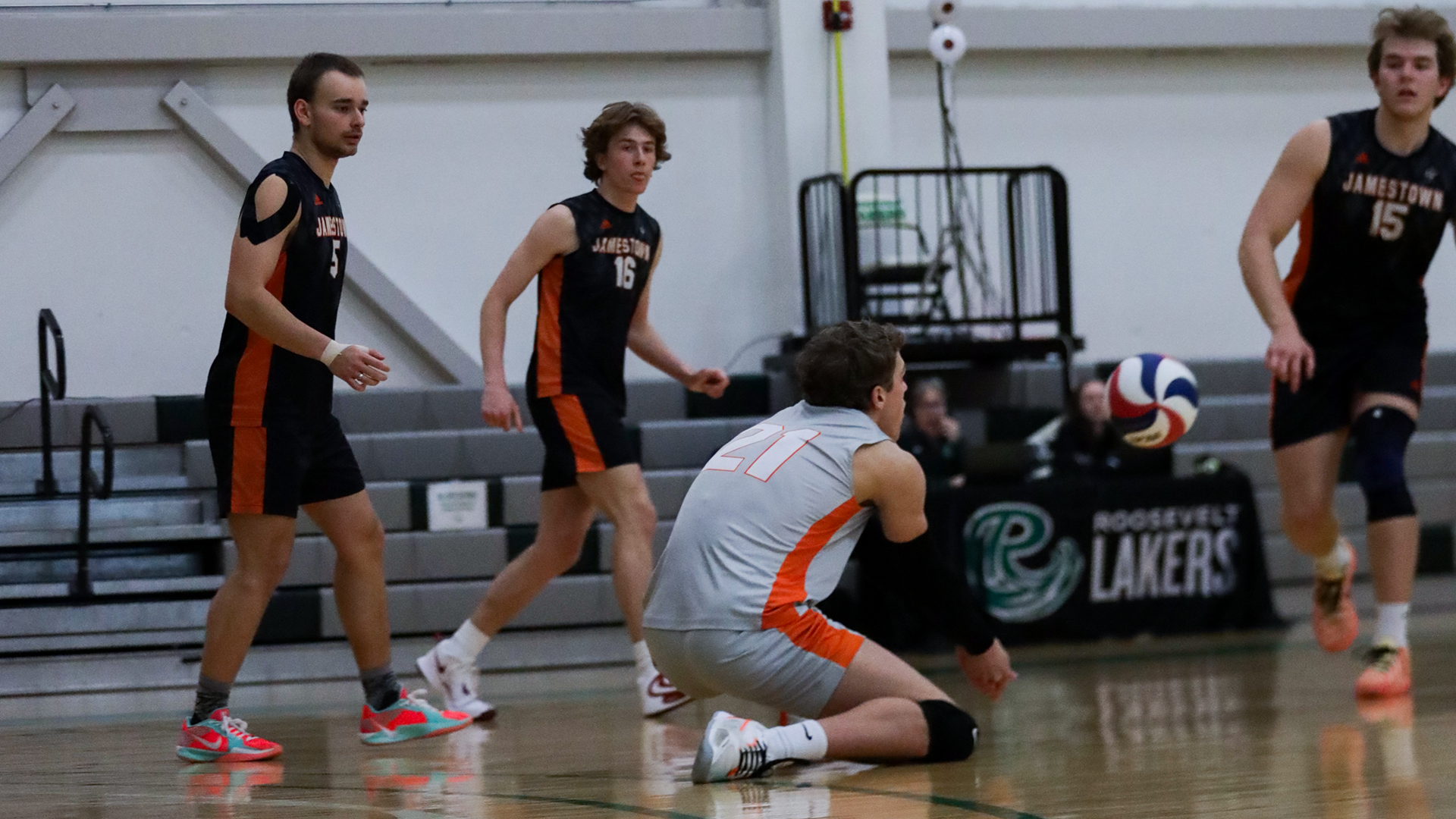UJ #21 Jackson Holmes receiving a ball in the back row