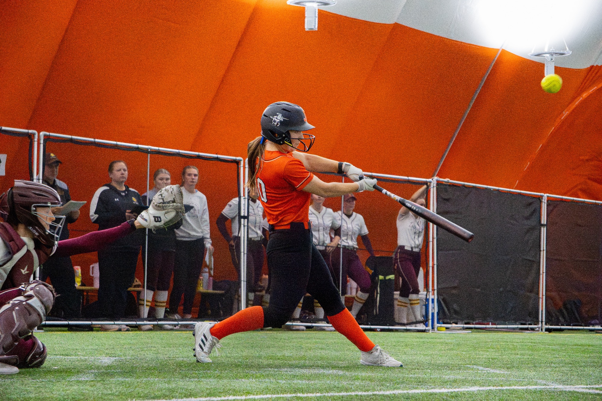 Jamestown #10 Maddie Speath makes contact with the ball in their split games agaisnt Minnesota Duluth in the Nelson Family Bubble April 12, 2026