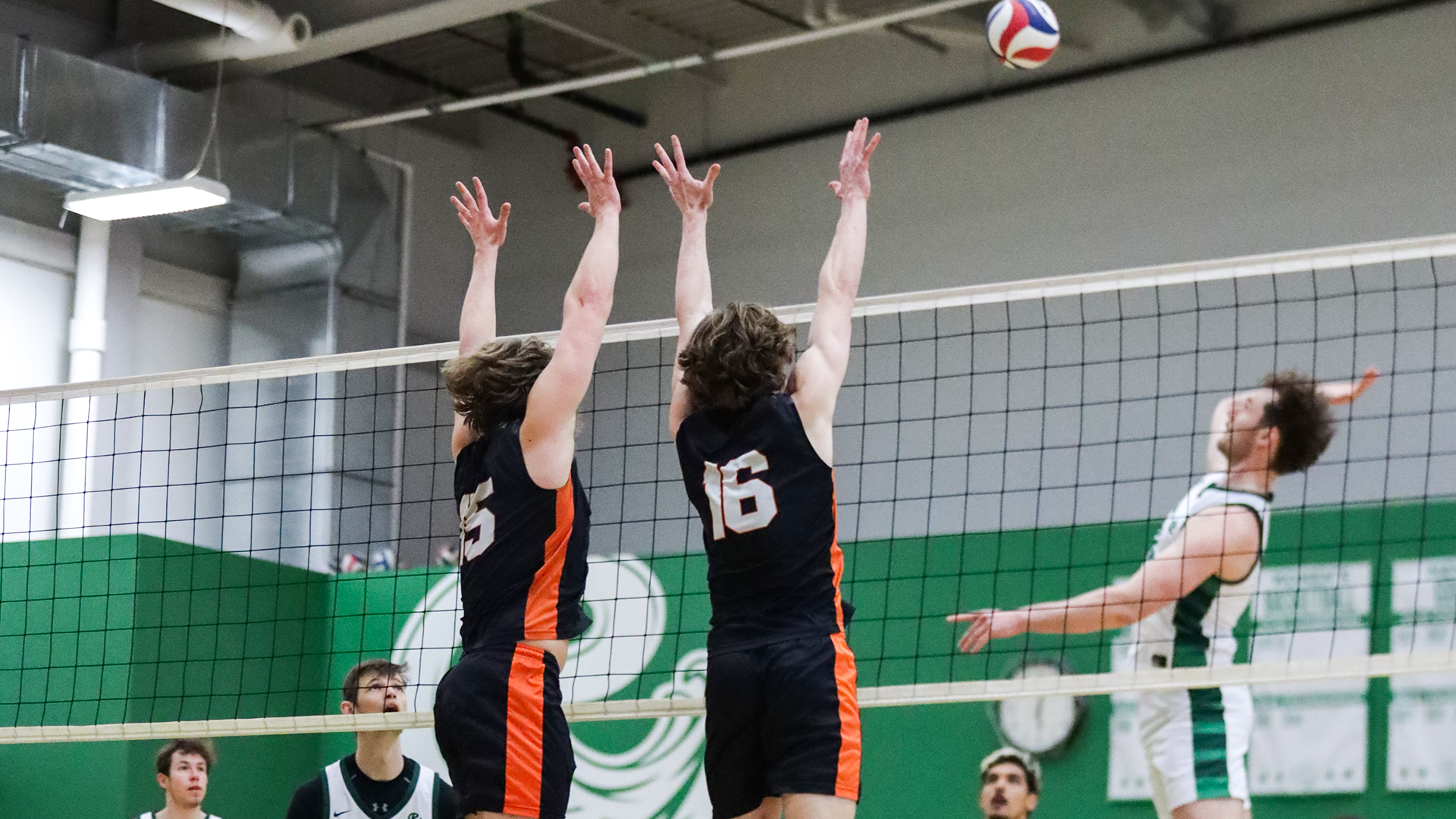 #16 and #15 Lucas Soeldner and Ethan Carroll double blocking at the net
