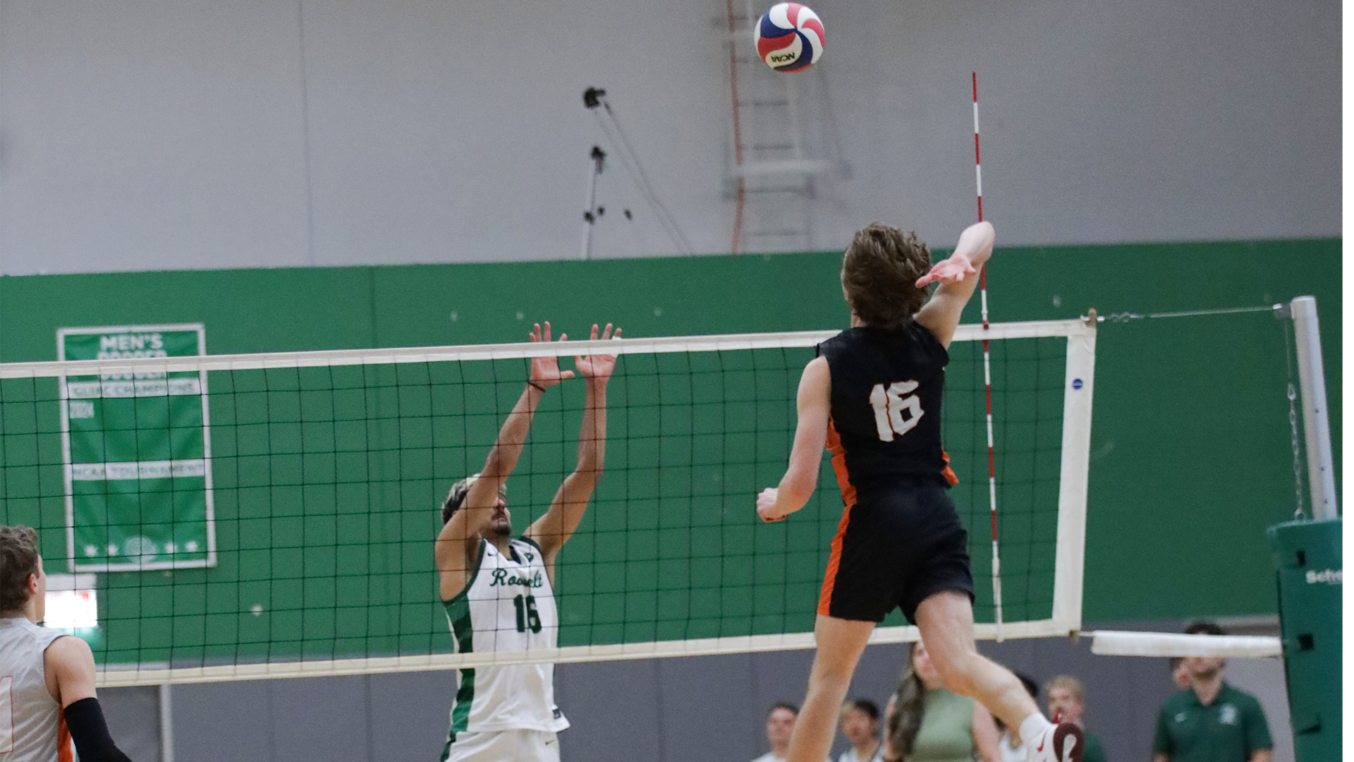 #16 Lucas Soeldner attacking the ball at the net