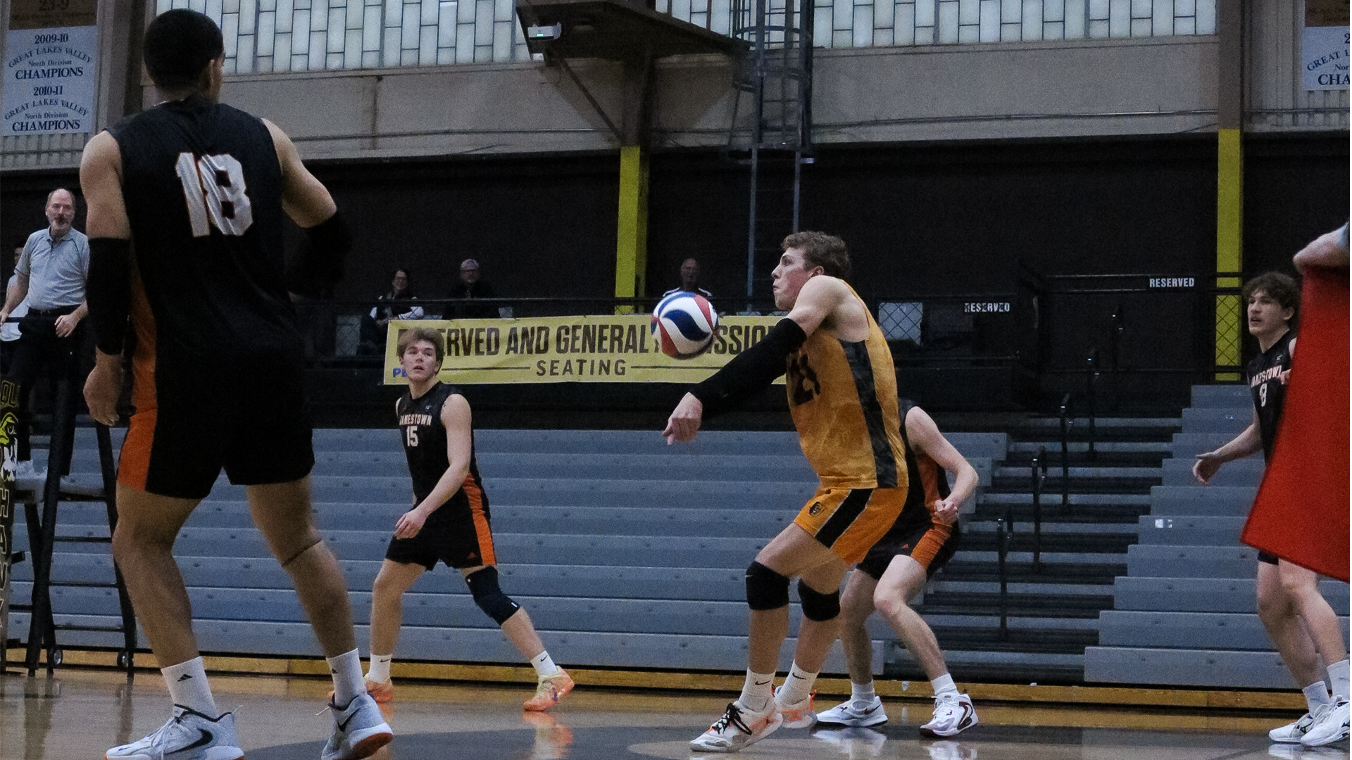 #21 Jackson Holmes passing a attack from the back row