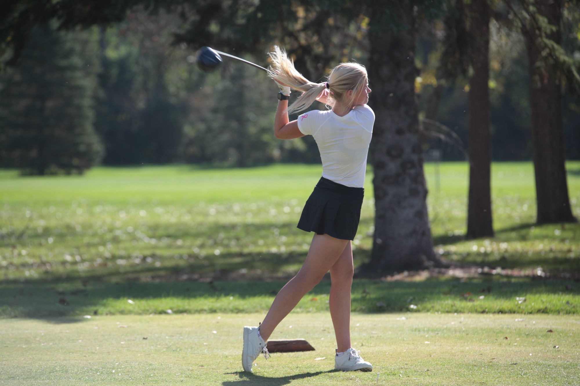 Jamestown Celi Nelson tees off in the UJ golf invite 
