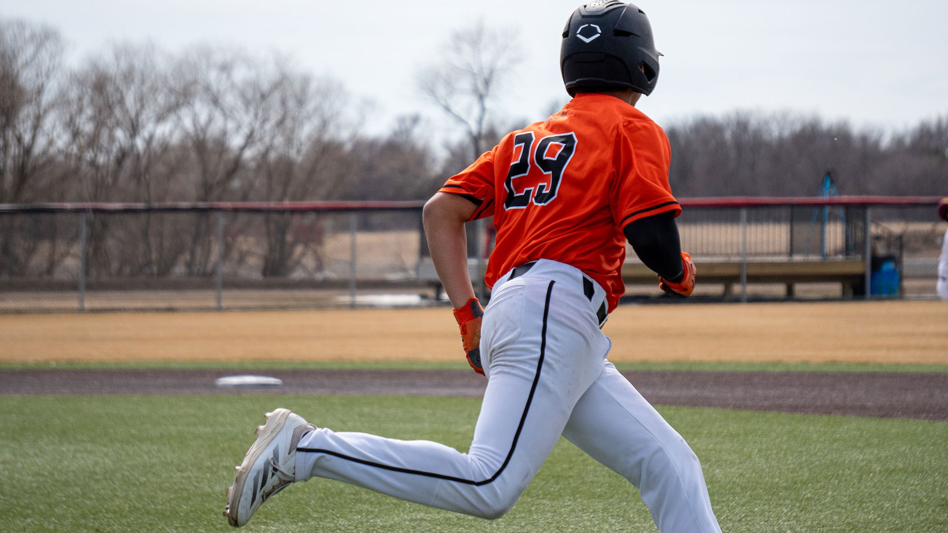 UJ's Melvin Maldonado watches his hit as he rounds first base