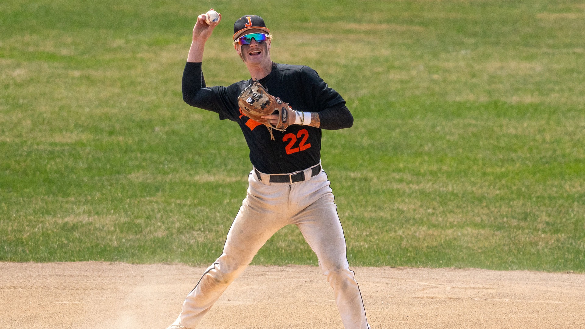 Ben Swennumson makes a throw to first base in a game earlier this season