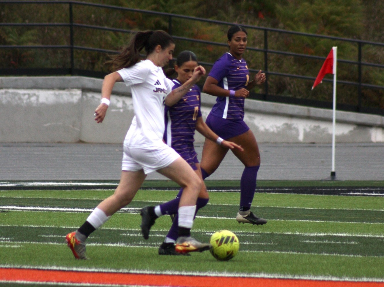 Vega Canada makes her way past a defender against Minnesota State University 